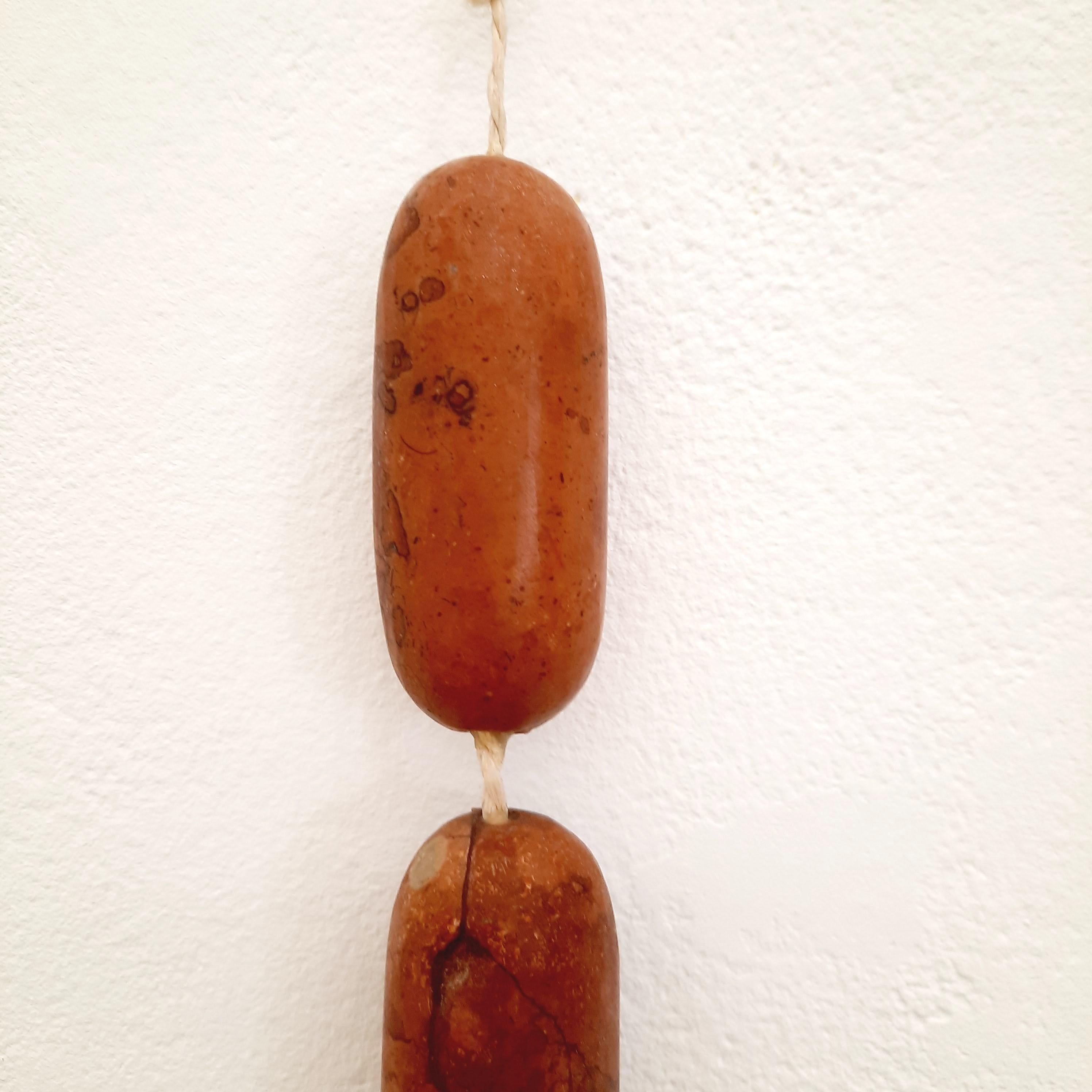 Taro Meissner
Appetizer (Knackerkette) - 21st Century Figurative Still-life Sculpture Marble
2018
48 x 4 cm
Unique Copy

Taro Meissner is hanging up heavy sausages, wishing to share with you the latest results of his research on the sensible