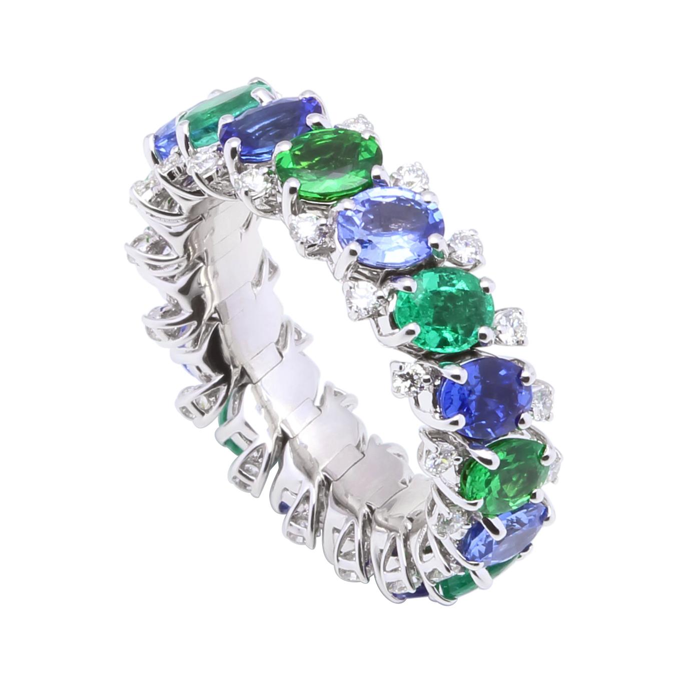 Diamond Emerald Sapphire Tsavorite Flexible Unique Eternity Band White Gold Ring

The multicolor Designs inspired by tartan colours (e.g. Chatham, Royal Stewart Tartan). Originally inspired by Shades of tartan, colour gemstones are prevalently used