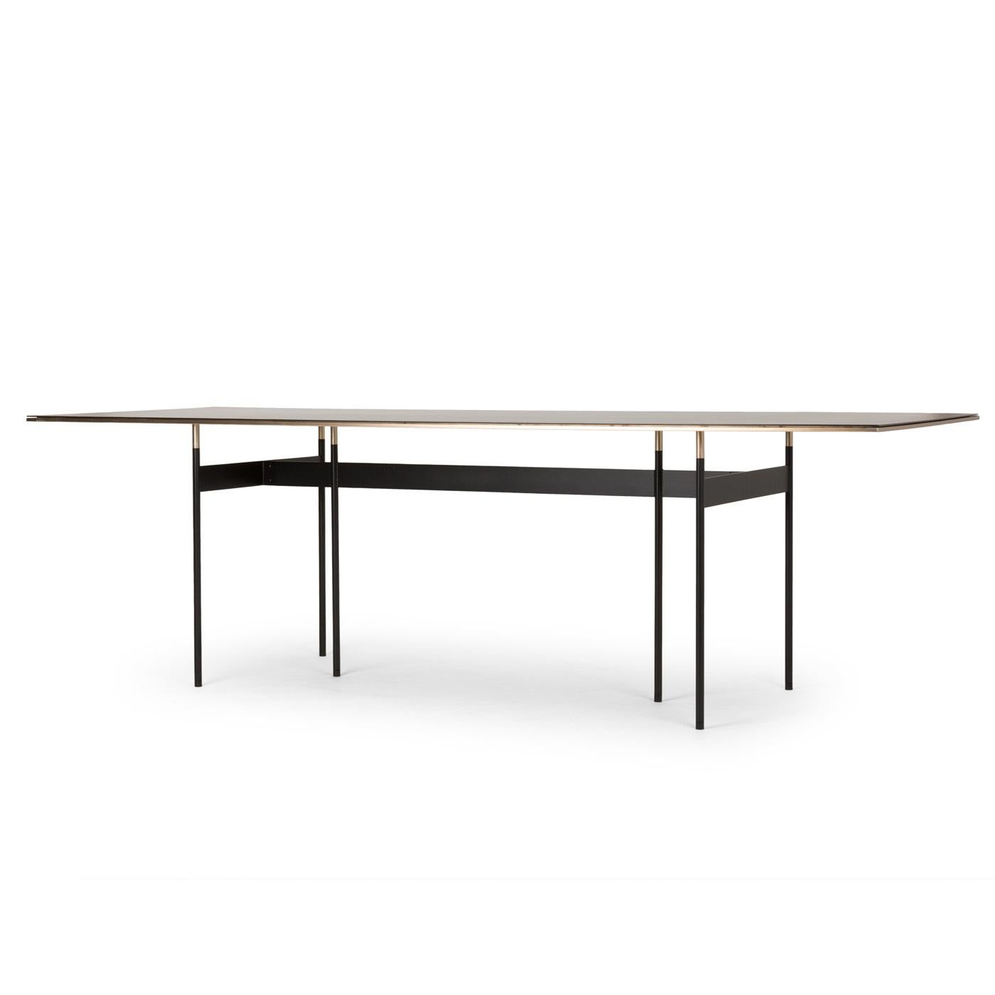 Designed by Simone Bonanni, this exquisite table mixes the horizontal lines of the top, with the vertical elements of the inner structure and legs, creating a piece made of air and metal. Visually rigorous, elegant, and exclusive, its silhouette