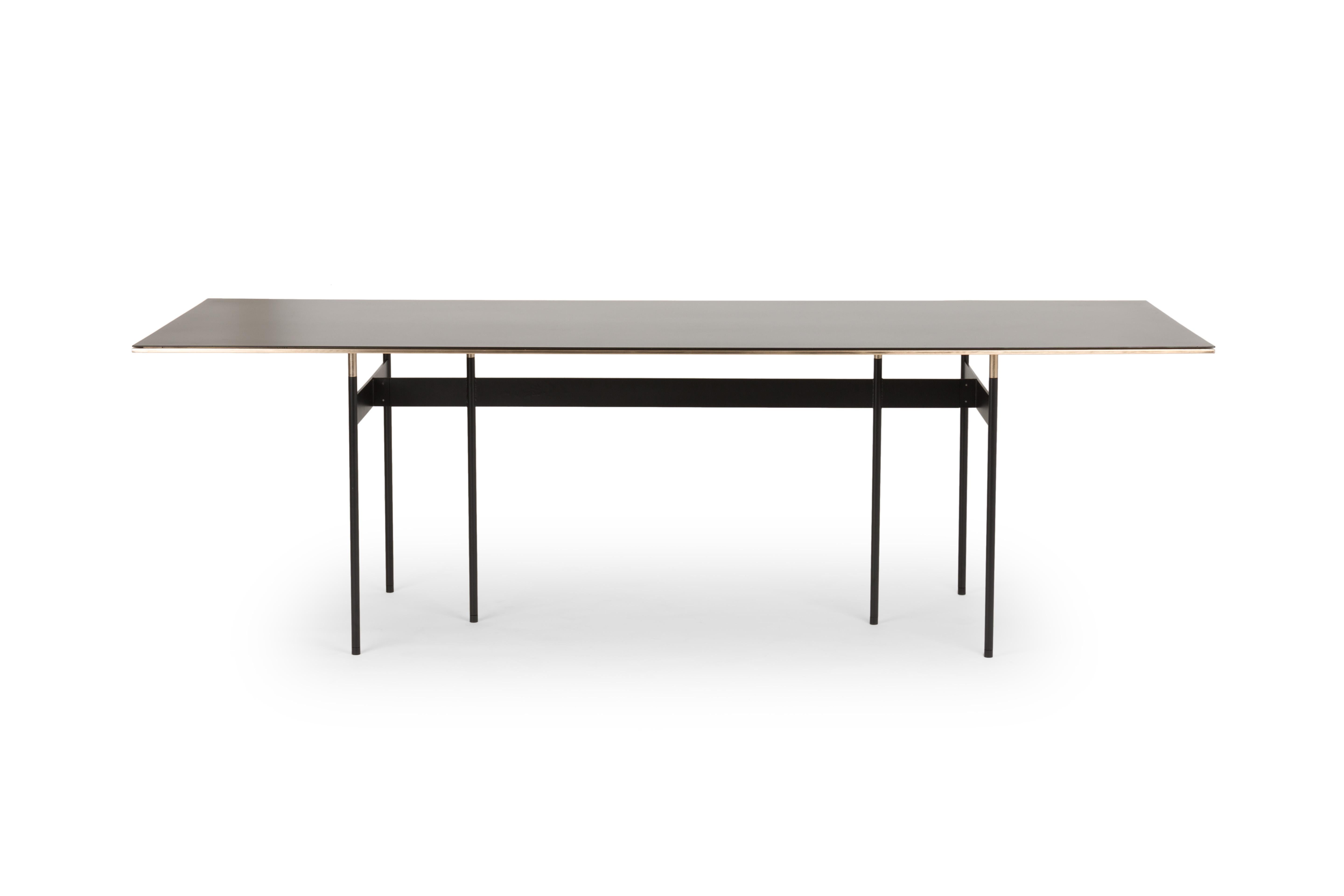 Tartan table by Mingardo
Dimensions: D240 x W90 x H72 cm 
Materials: Varnished black iron with brassed details
Weight: 80 kg

Also Available in different finishes.

Horizontal and vertical lines cross, touch and overlap each other; this is