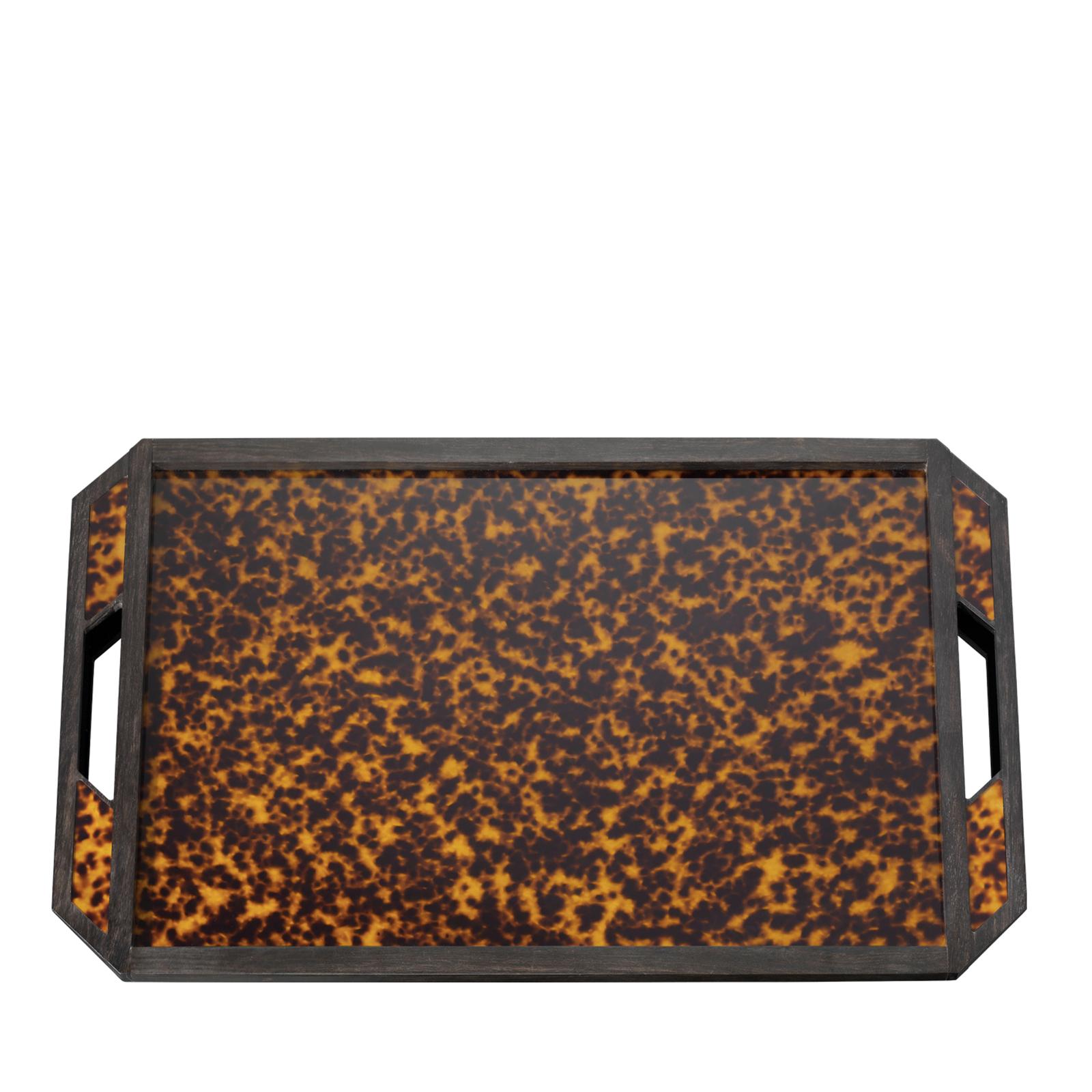 This elegant tray is part of the Tartaruga collection, entirely handmade of Lucite decorated with a tortoiseshell pattern. Its octagonal shape is highlighted by a frame of solid ebony wood.