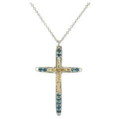 Taru Jewelry Collier de croix en or jaune et argent avec topaze bleue