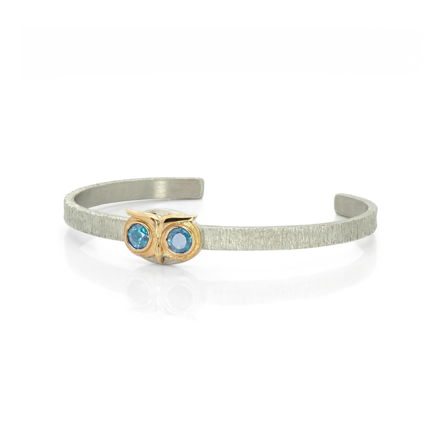 Contemporary Taru Jewelry Owl Blue Topaz Yellow Gold and Silver Bangle Bracelet For Sale