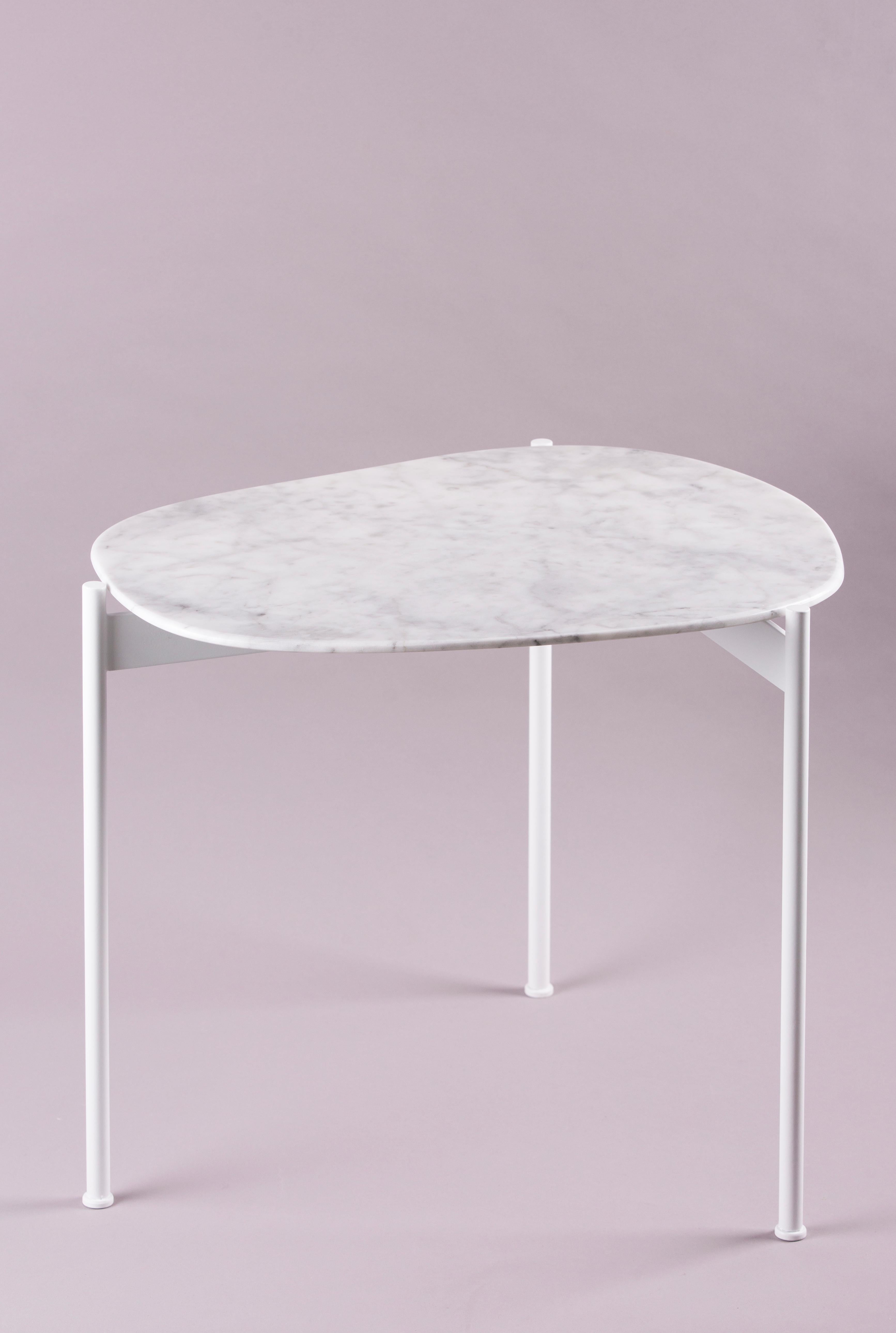 Tas coffee table by Rectangle Studio
Dimensions: W 44 x D 52 x H 45 cm 
Materials: White marble, white paint coating on metal

We produced 'Tas02' which is inspired by the stones that are shaped by nature and with its freeform.
On every