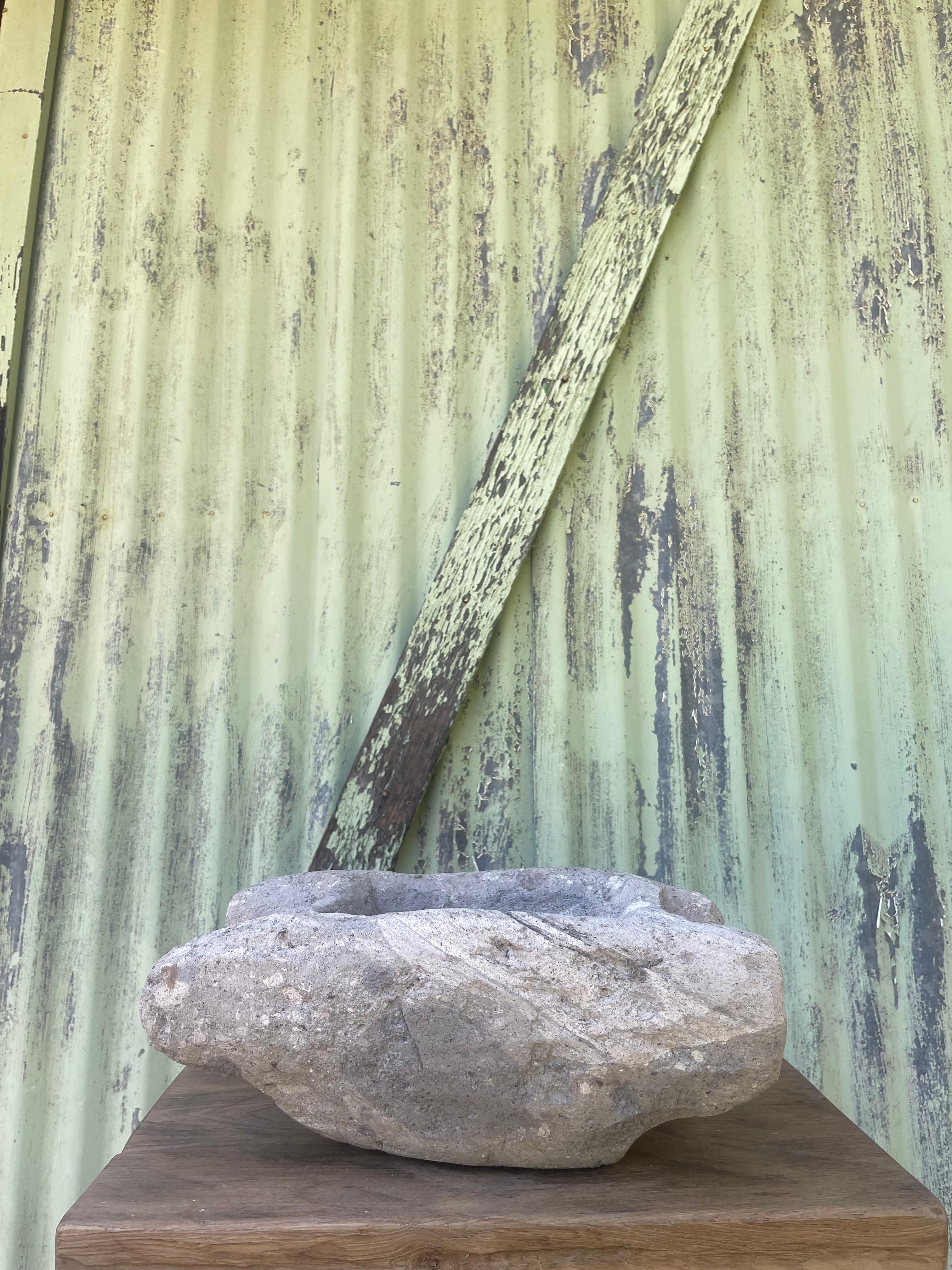 This stone mortar, dating back to turn of the century, is sourced from Central Anatolia where it has been used by generations of families to create the flavor that marks traditional local cuisine. This piece is made from durable stone with a deep,