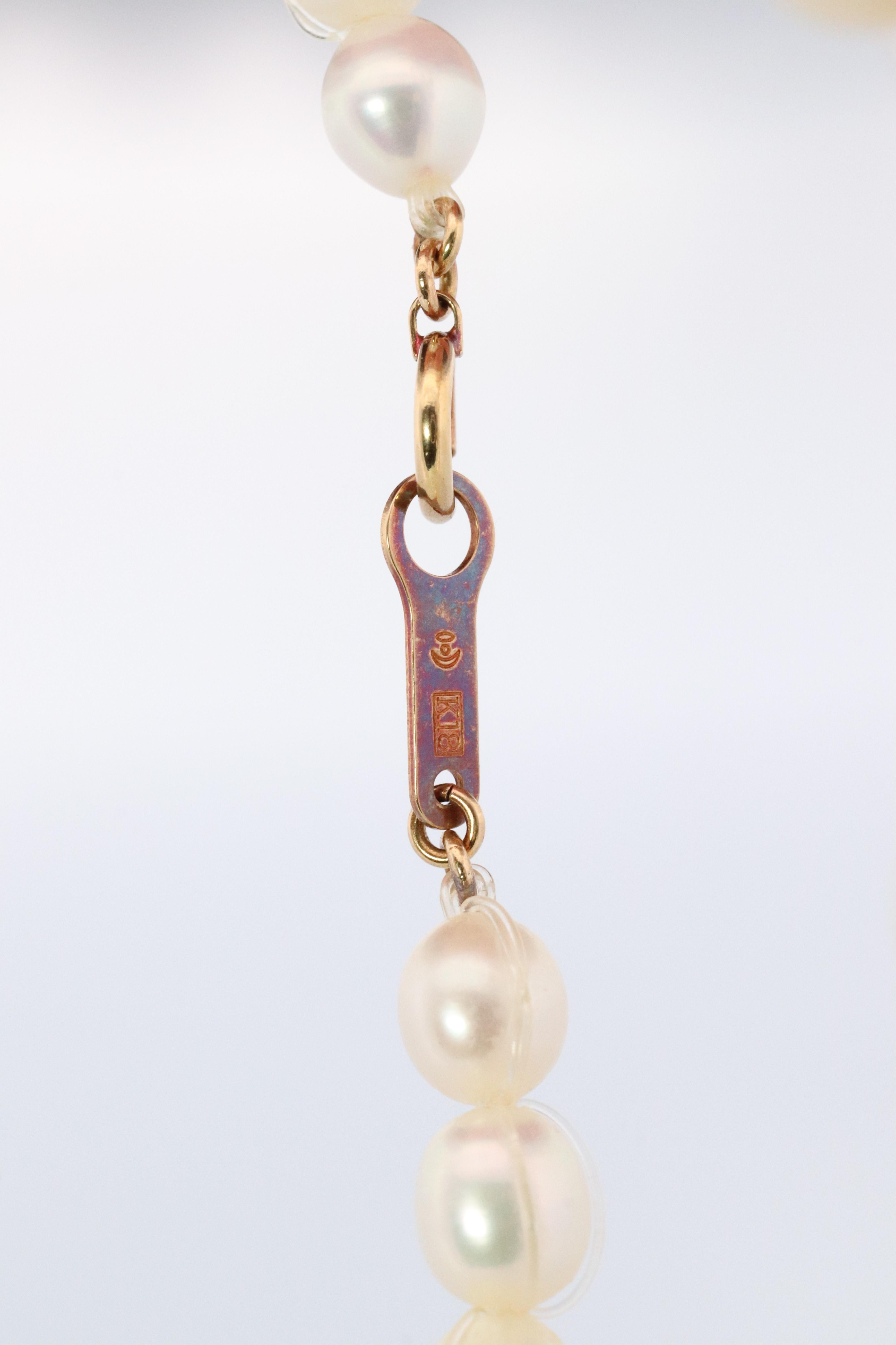 Tasaki Necklace. 18k Tasaki Invisible Pearl Multi Strand Necklace In Good Condition For Sale In Port Charlotte, FL