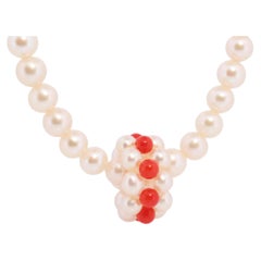 Tasaki Necklace. 18k Tasaki Pearl and Coral Bead Strand Necklace.