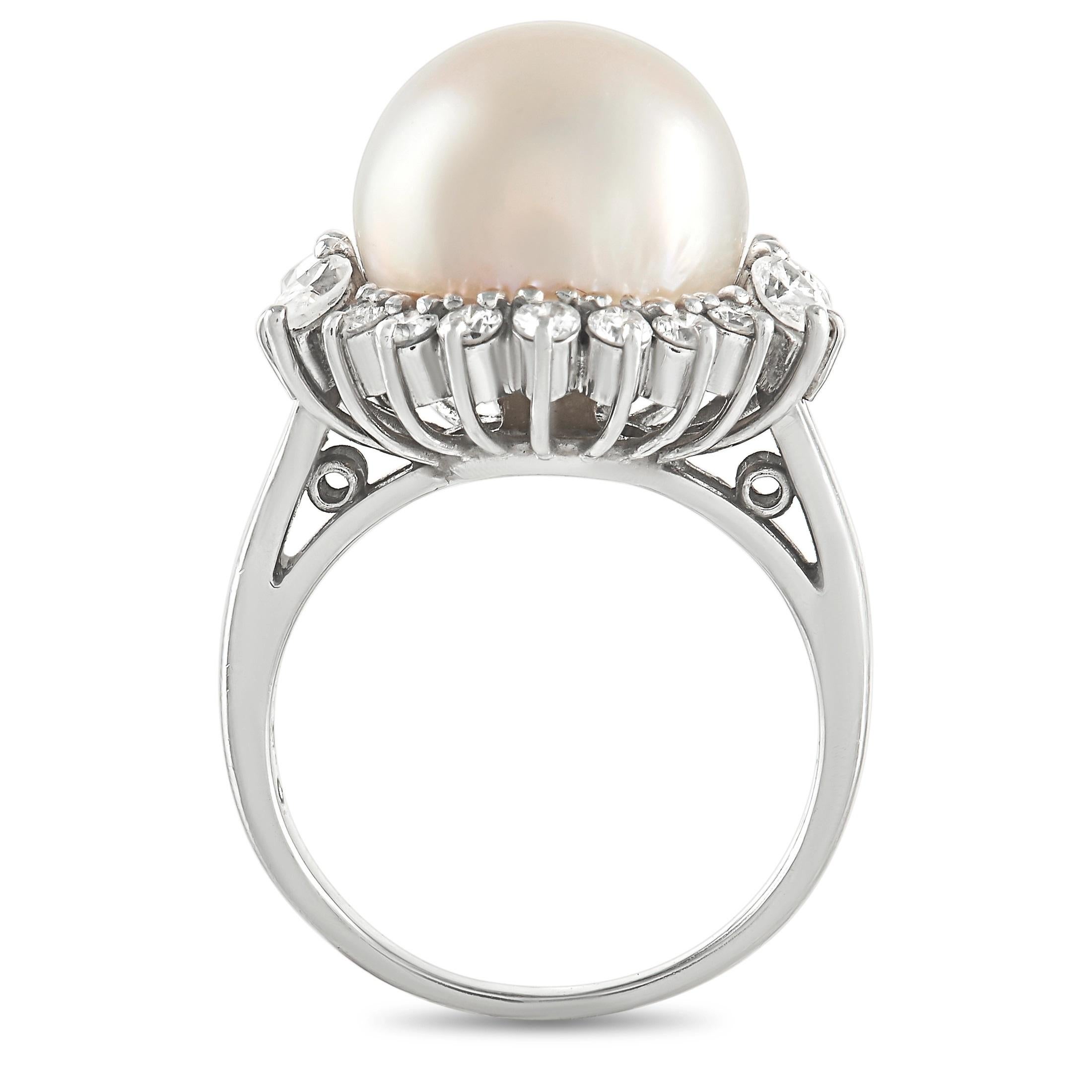 This impeccably crafted Tasaki ring will always make a statement. Perched atop a 2mm band crafted from pure platinum, you’ll find a luminous pearl center stone surrounded by a halo of diamonds totaling 0.90 carats. A 14mm top height means this piece