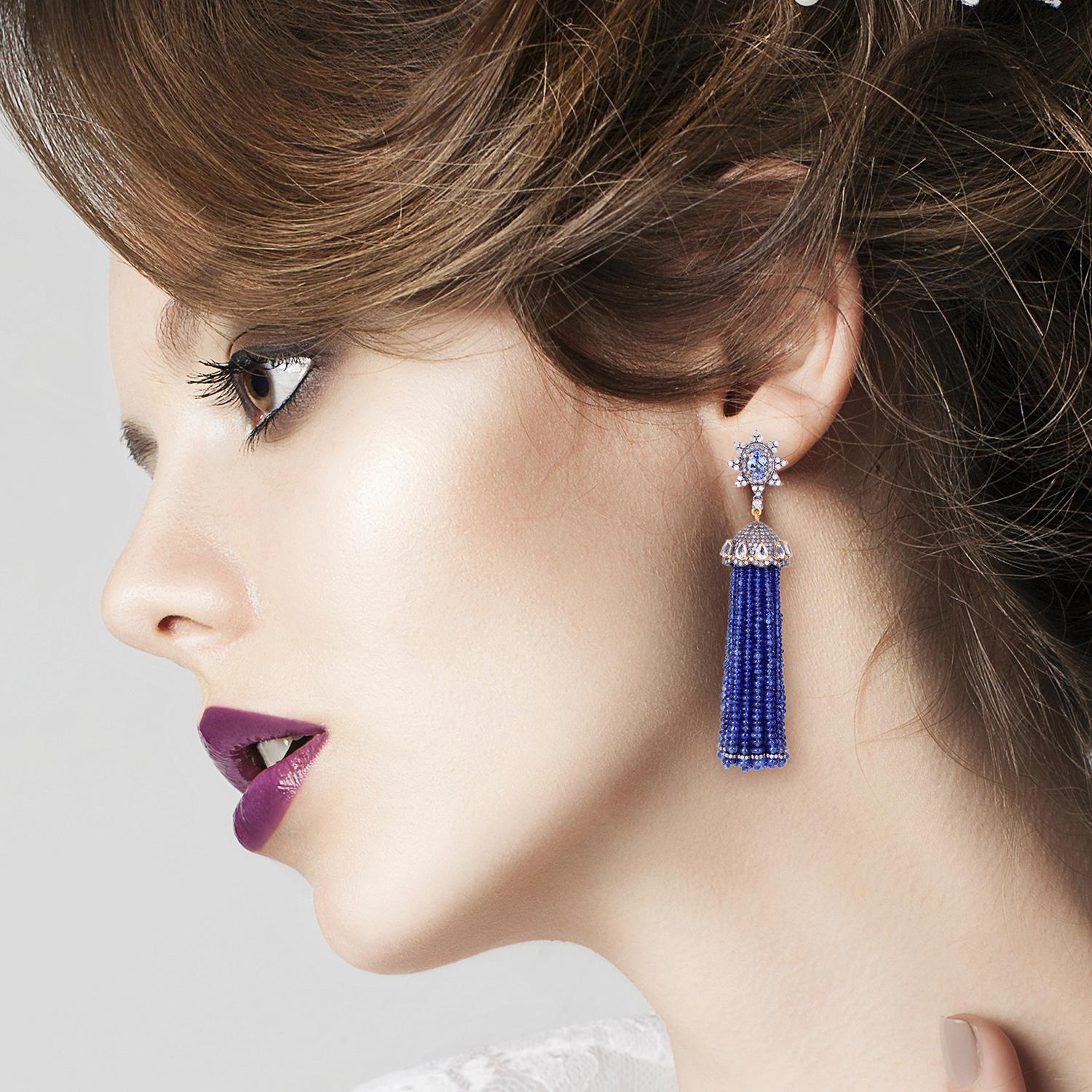 These stunning exceptional tassel earrings are handmade in 18-karat gold and sterling silver.  It is set with 157.8 carats sapphire, 2.0 carats tanzanite and 4.835 carats of glittering diamonds. 

FOLLOW  MEGHNA JEWELS storefront to view the latest