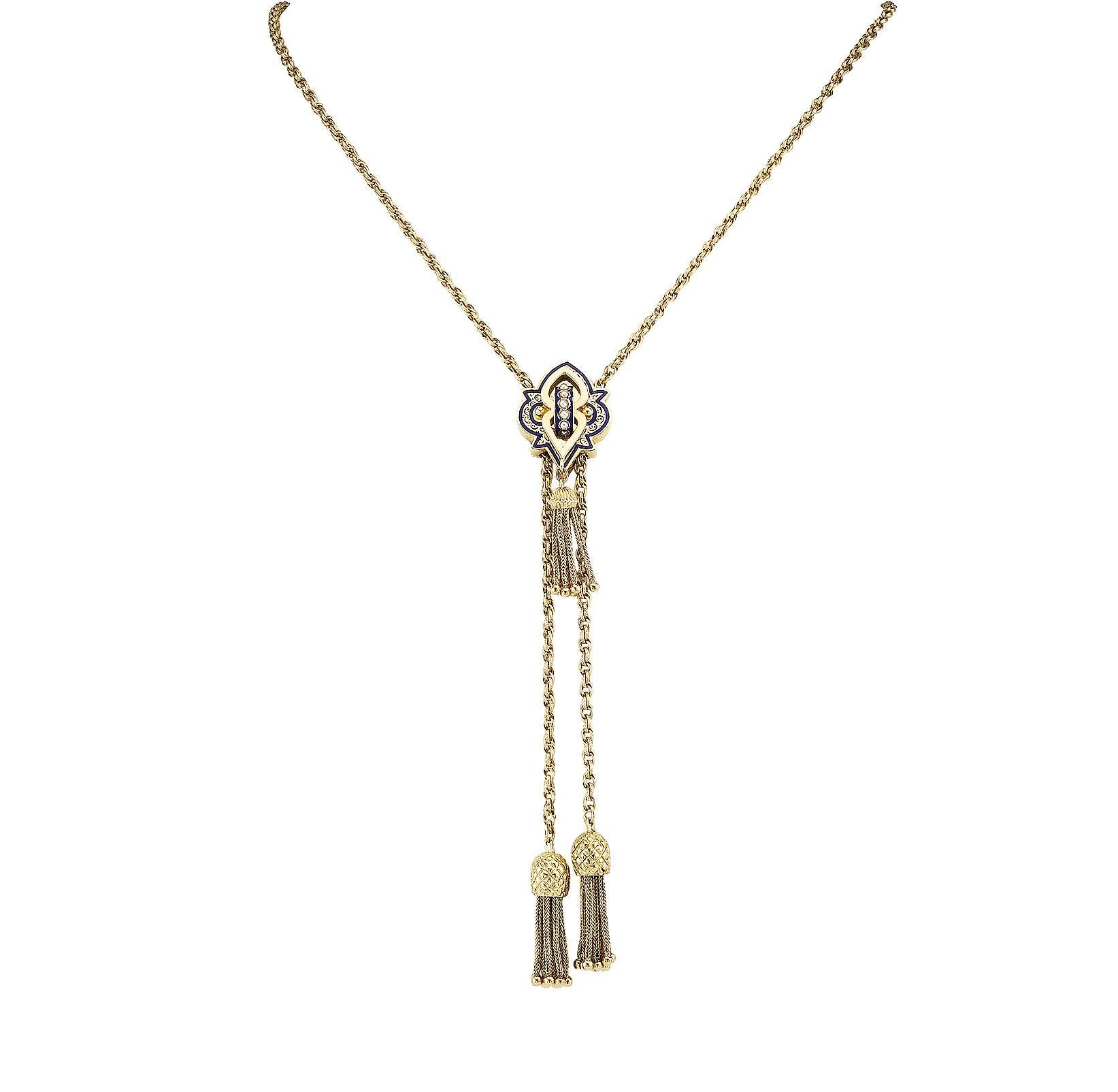 Estate tassel and slide long chain yellow gold necklace decorated with blue enamel and pearls circa 1950.
DETAILS:
GEMSTONES: pearls.

METAL: 14-karat yellow gold with blue enamel decorations.

MEASUREMENTS: approximately total length with tassels