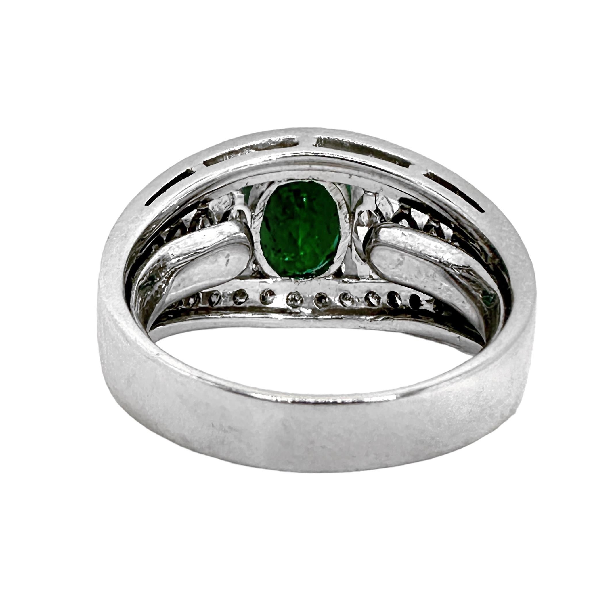 Oval Cut Tasteful 18K White Gold Emerald and Diamond Cocktail Ring For Sale