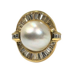 Tasteful and Scintillating Pearl, Diamond and Yellow Gold Ring