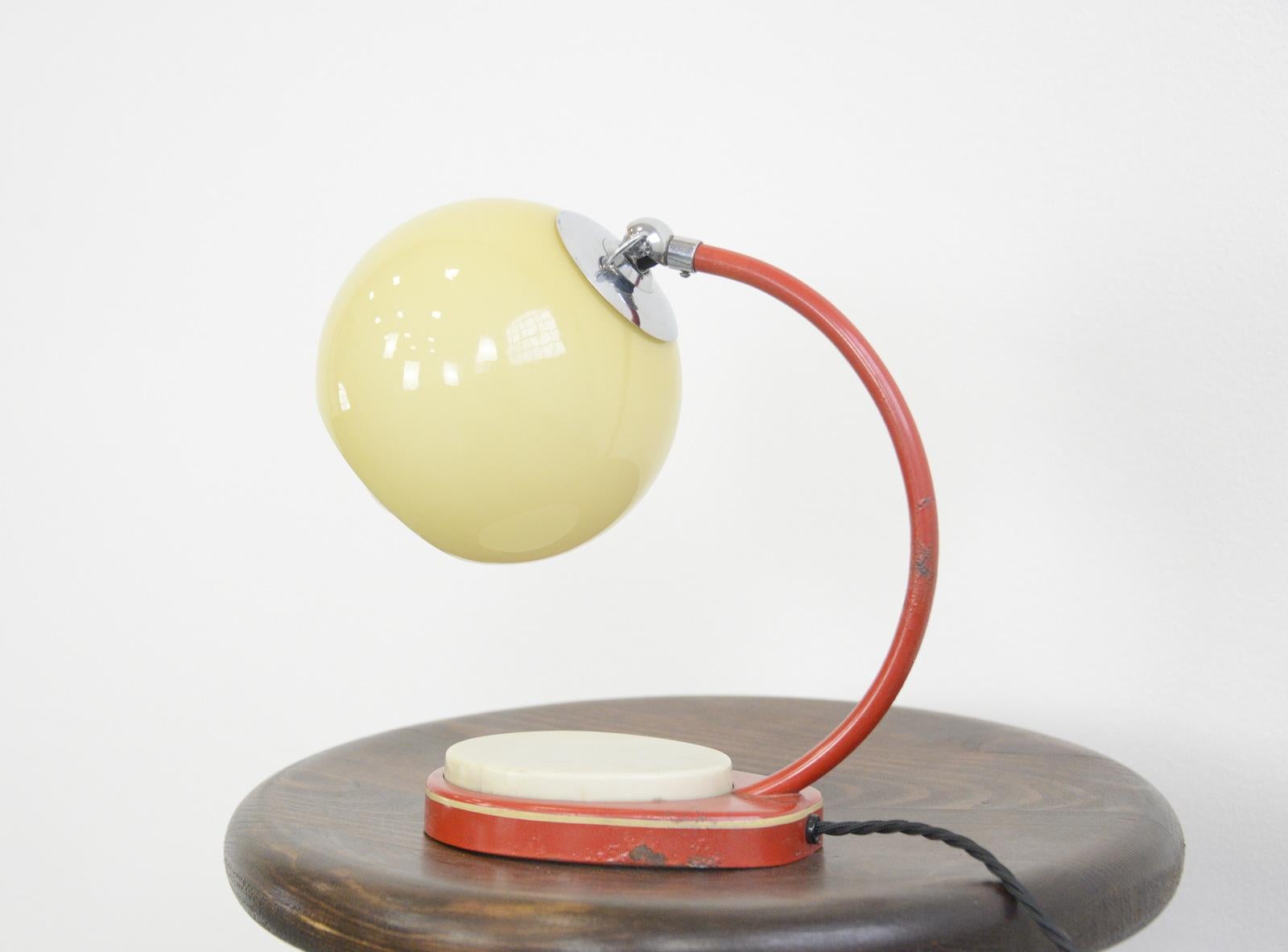 Tastlicht table lamp by Marianne Brandt for Ruppel

- Original red paint with pinstriping 
- Glass shade
- Takes E27 fitting bulbs
- Large touch switch
- Designed by Marianne Brandt for Ruppel
- German ~ 1920s
- Measures: 23cm tall x 11cm