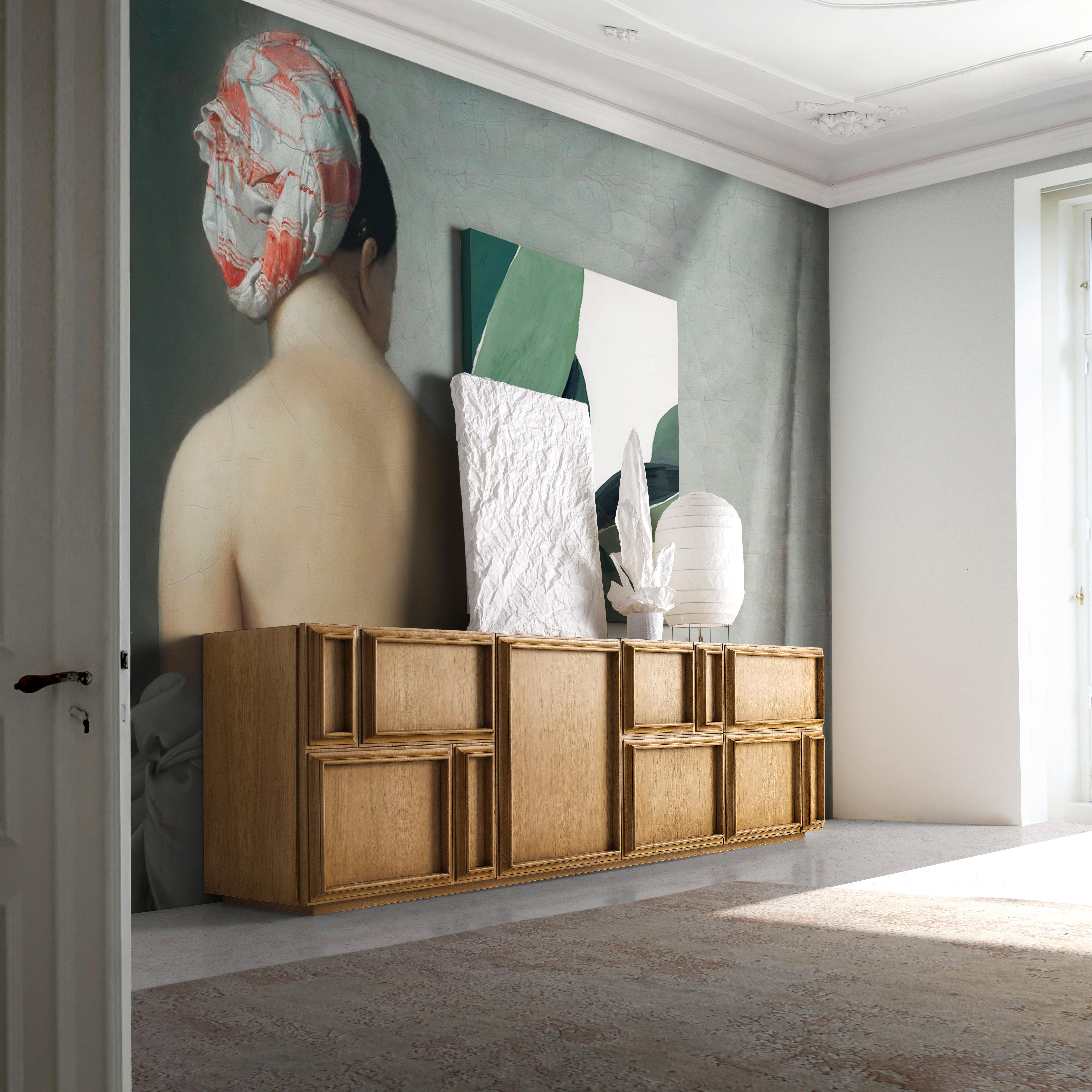 Tatel Sideboard by Lola Glamour
Dimensions: D 45 x W 220 x H 70 cm
Materials: Oak.

The design of this low sideboard is inspired by wooden panels that fit together to achieve a geometric, continuous, and harmonious design. They form four doors with