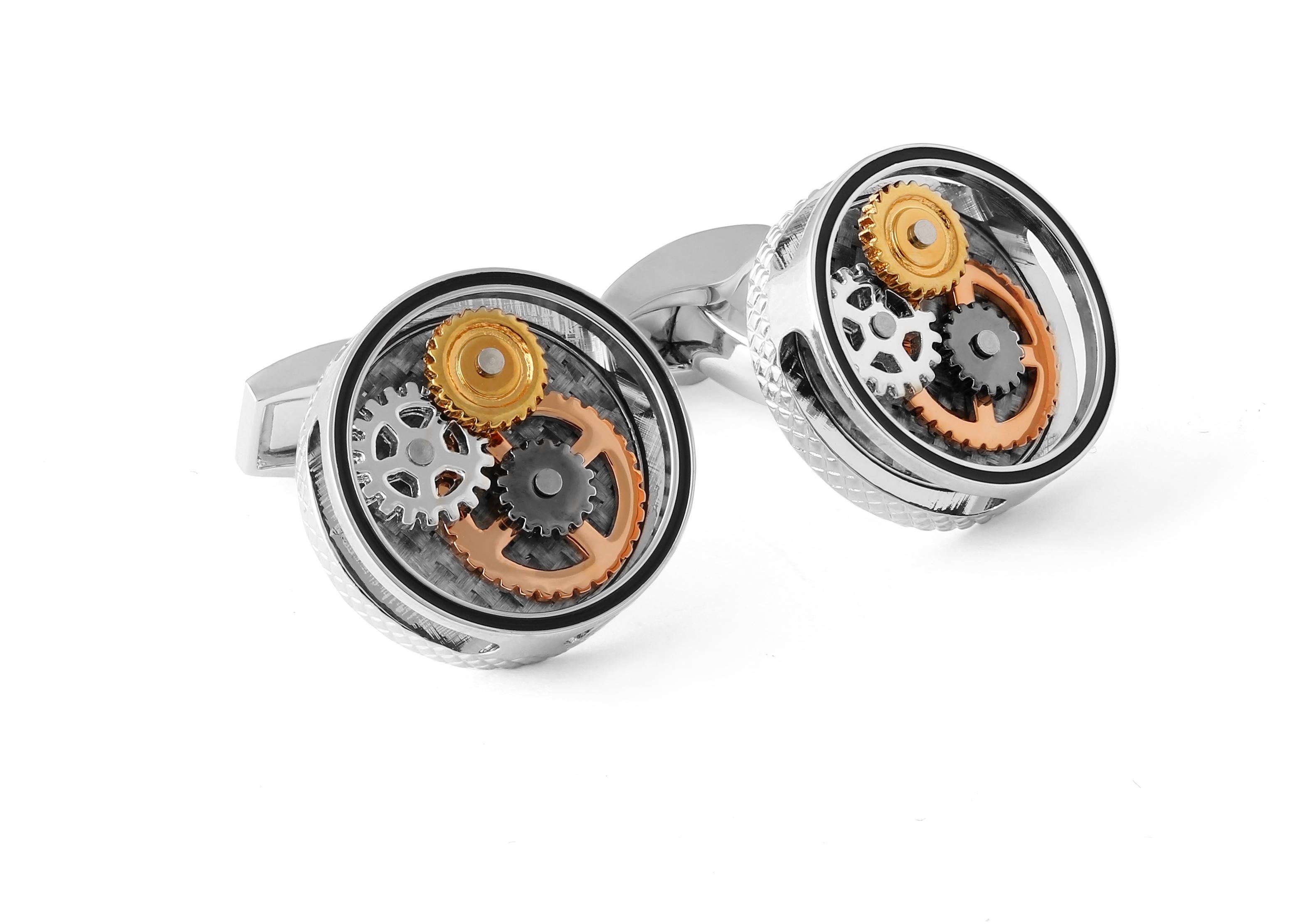 One of our bestsellers, a combination of coloured gears all rotate separately creating fun and movement - an evolution of the idea of motion and movement that is the Tateossian signature. Masculine circle frame cufflinks feature carbon fibre which
