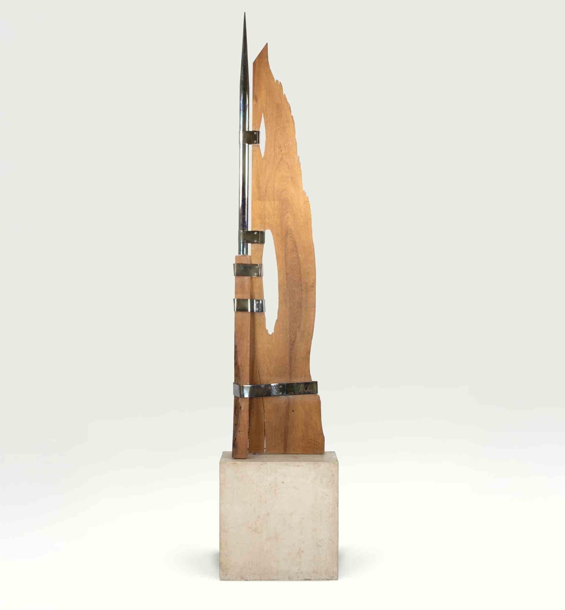 Wood and iron sculpture realized by Tatiana Pomus in 1977.

Exhibited at Quadriennale Nazionale d'Arte di Roma in the same year.

Placed on a marble base.

Height without base: 196 cm.

Hand signed.

Very good condition.