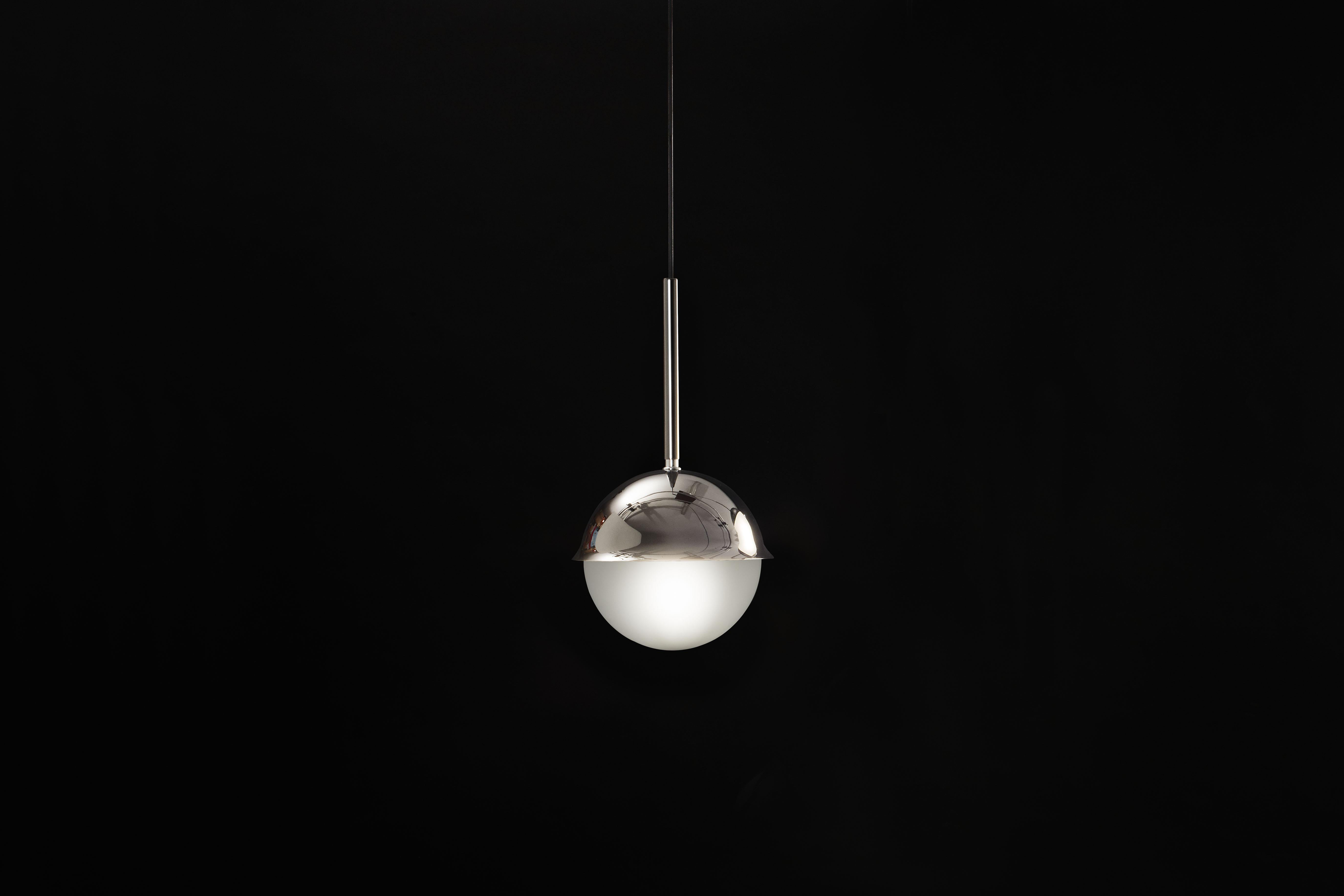 Netta Sospensione pendant lamp in black chrome and satin glass for Tato Italia. Designed by Antonia Astori in 2017. Executed in black chrome, iron, brass and glass.

Price is per item. Available to order in unlimited quantities.

In stock lead