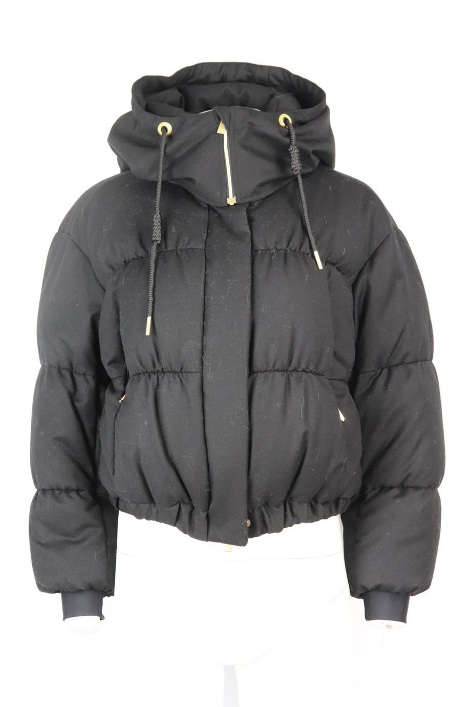Tatras hooded quilted wool down jacket. Black. Long sleeve, crewneck. Zip fastening at front. 100% Wool; lining: 100% nylon; padding: 90% down, 10% feathers; cuffs: 79% polyester, 21% polyuthane. Size: UK 10 (US 6, FR 38, IT 42). Shoulder to