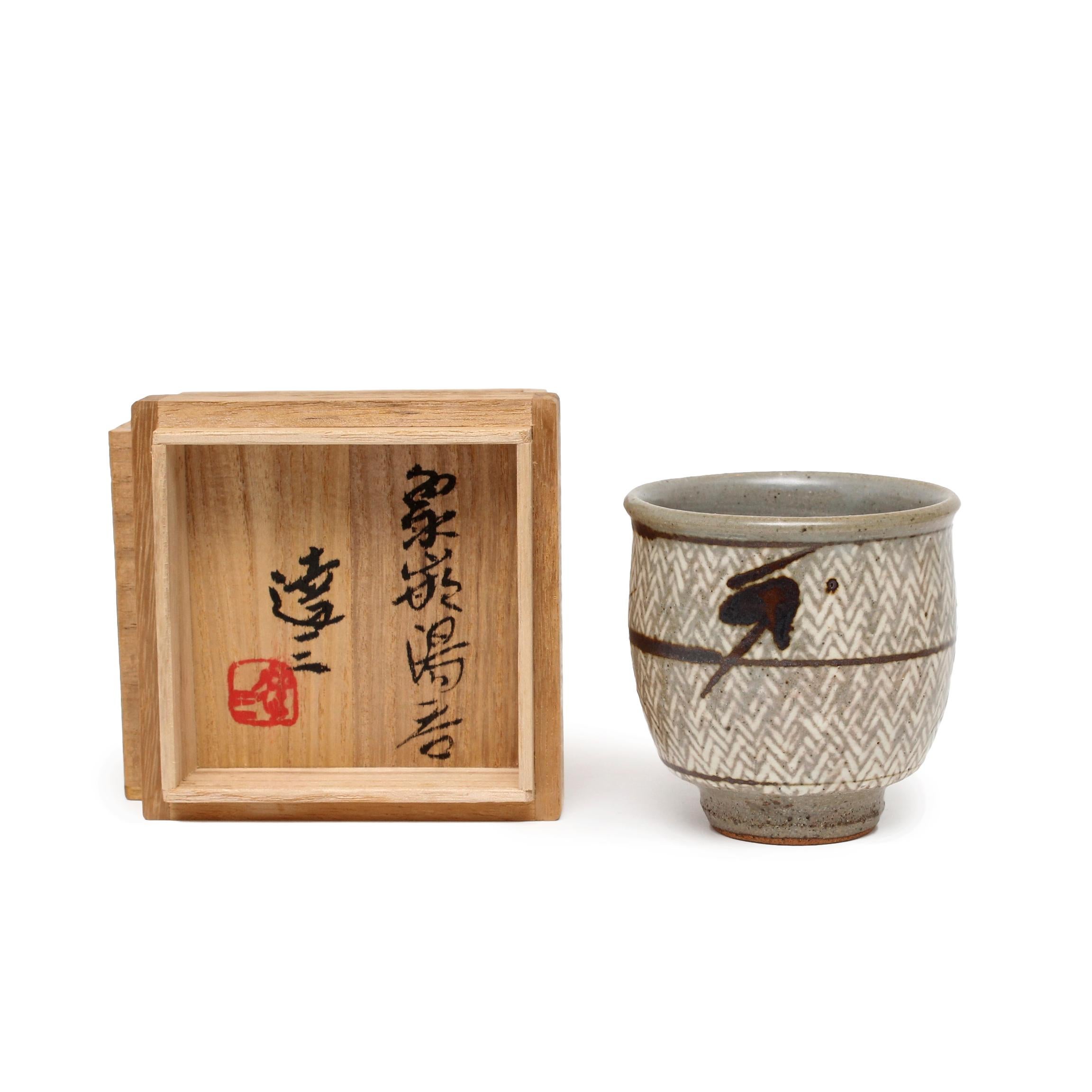 Tatsuzo Shimaoka 
Yunomi with Signed Box 
underglaze iron decoration
3.25 x 3 x 3"
date unknown
signed by artist