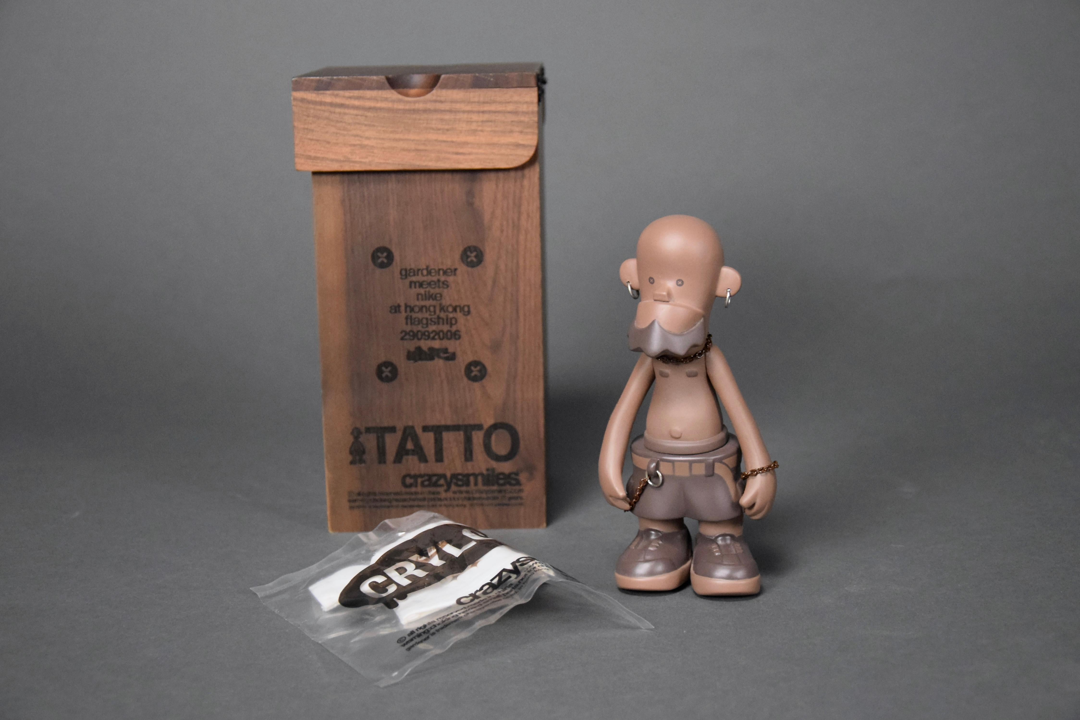 Tatto limited edition Gardener meets Nike 2006 Art Toy in beautiful laser engraved wooden box by Michael Lau and produced by Crazysmiles. This rare piece comes with it's original box, sealed figure and T-shirt. All in great condition. Tatto has