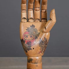 Tattooed Wooden Arm
