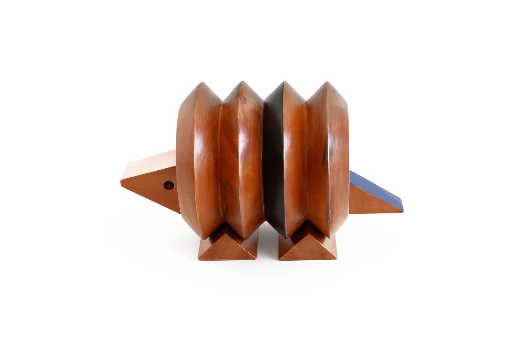 TATU-BOLA (armadillo in Portuguese) is part of Bichos do Brasil collection that is decorative and collectible objects of wooden figures that represent animals of the Brazilian Fauna.
The design of the collection translates into a balance between