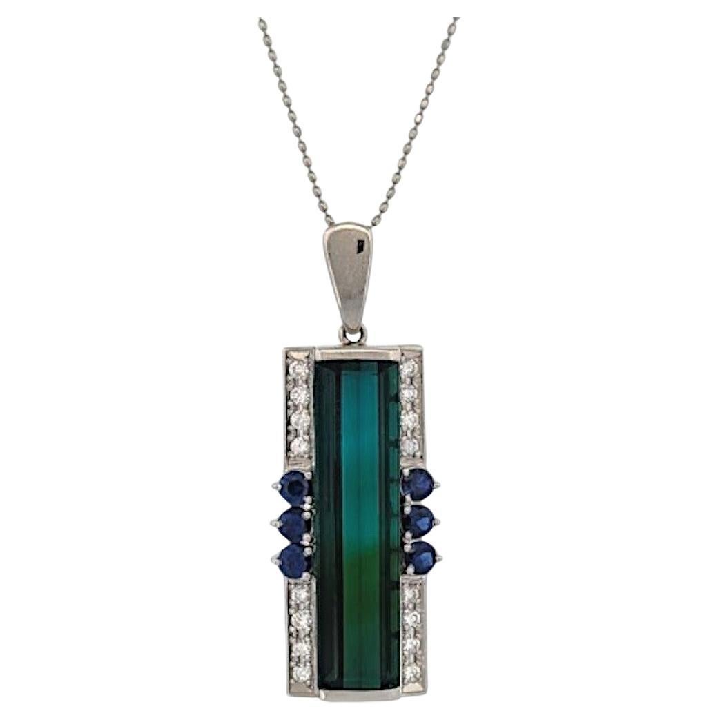 Tatum  Platinum Pendant with 12.24 ct Tourmaline, .60 ct Natural Sapphires For Sale