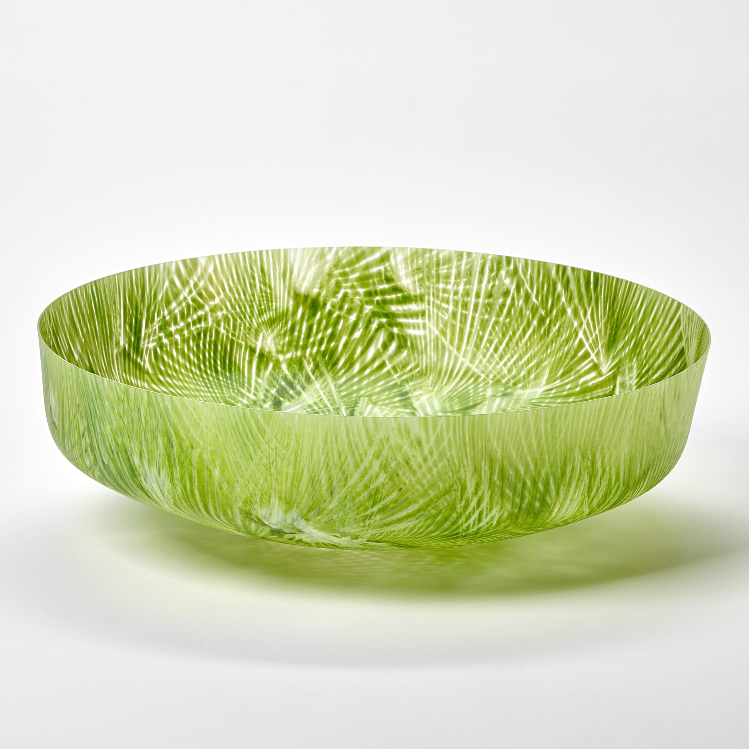 'Taubate' is a unique sculptural bowl and centrepiece by the British artist, Amanda J Simmons.

In the artist's own works;

