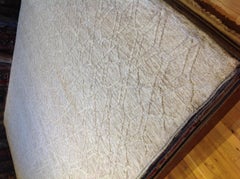 Ivory and Cream High Low Area Rug