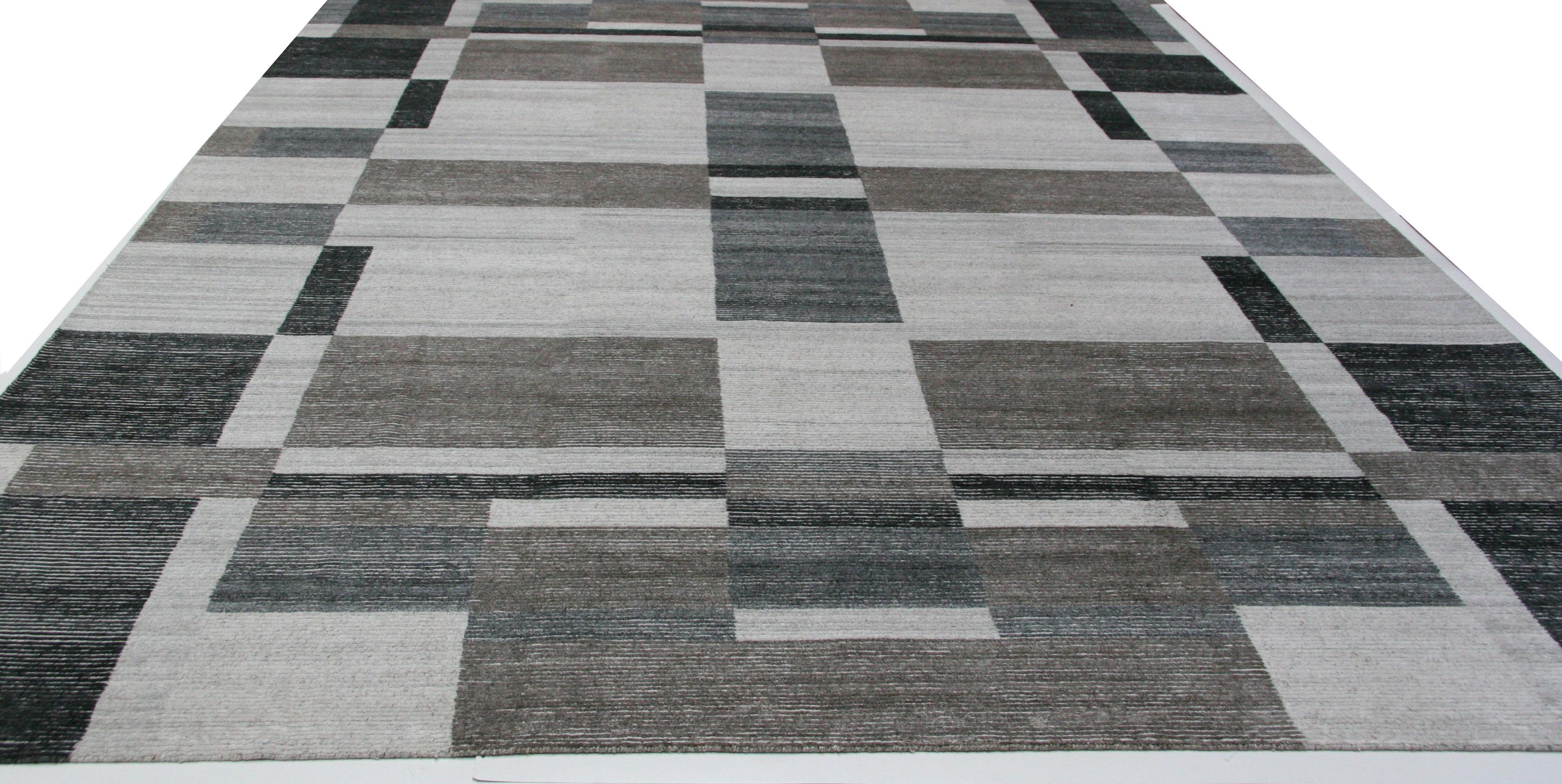 Cool and contemporary colors and geometric pattern create a piece well-suited for the modern home or office. Neutral beige/grey/taupe/off-white and black tones. A wool cotton blend makes for durability and comfort under foot. 

Hand knotted in