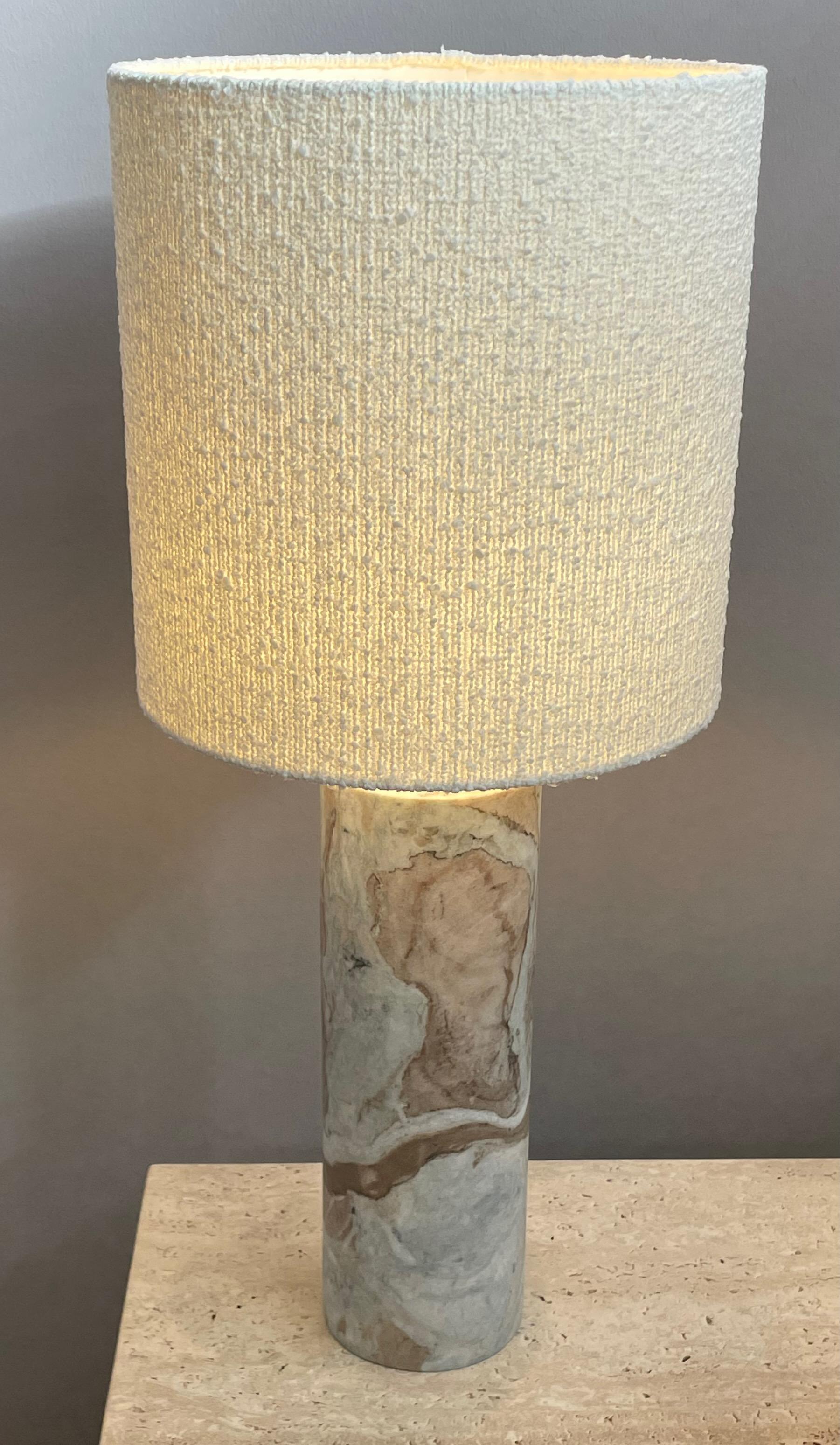 Contemporary Netherlands pair of cylinder shaped marble lamps.
Boucle shades  12