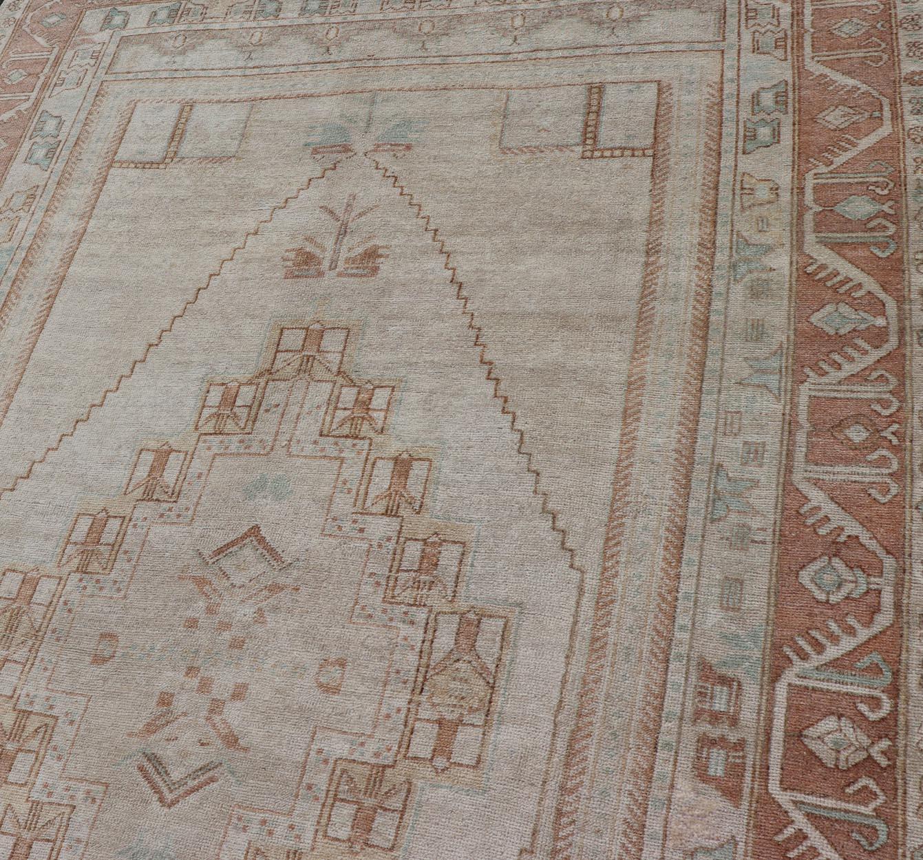 Taupe Background Turkish Vintage Oushak Rug with Tribal Medallion Design In Good Condition For Sale In Atlanta, GA