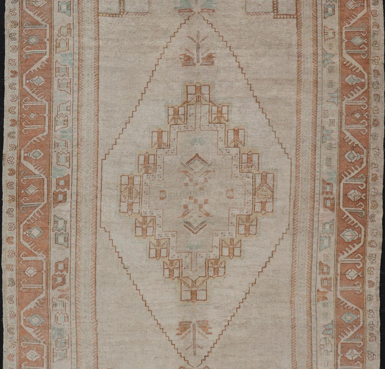 Taupe Background Turkish Vintage Oushak Rug with Tribal Medallion Design For Sale 1