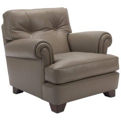 Fauteuil en cuir taupe:: Poltrona Frau