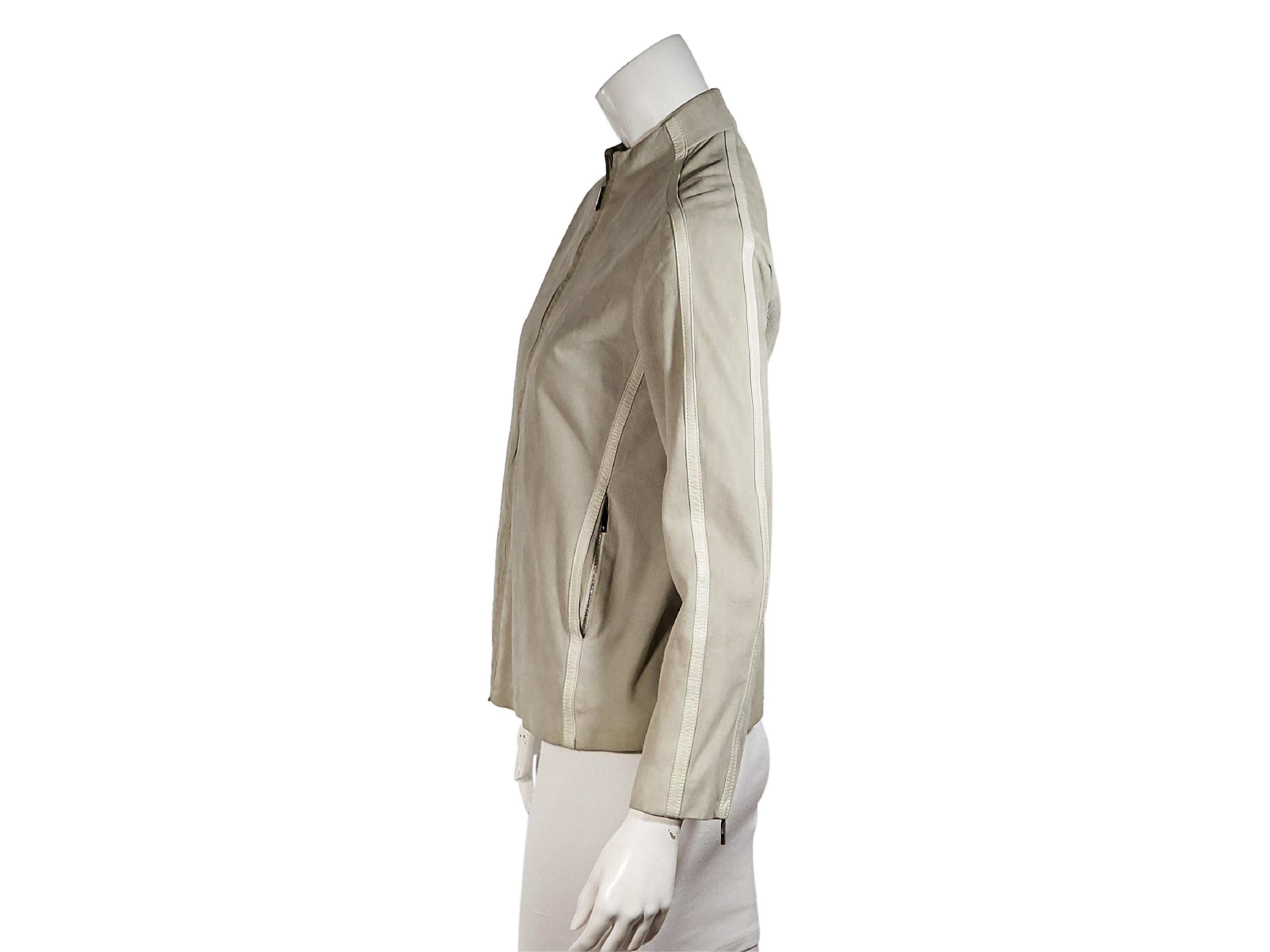 Product details:  Taupe suede jacket by Louis Vuitton.  Trimmed with leather.  Stand collar.  Long sleeves.  Zip cuffs.  Zip-front closure.  Label size IT 40.  36