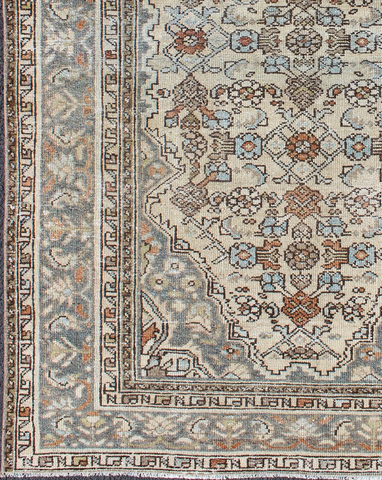 Neutral tones antique Malayer rug from Persia with floral design, rug sus-1807-240, country of origin / type: Iran / Malayer, circa 1920.

This beautiful antique early 20th century Persian Malayer carpet features a beautiful all-over design of