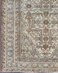 Antique Persian Malayer Rug with Soft Blue, Ivory, and Brown Geometric Medallion