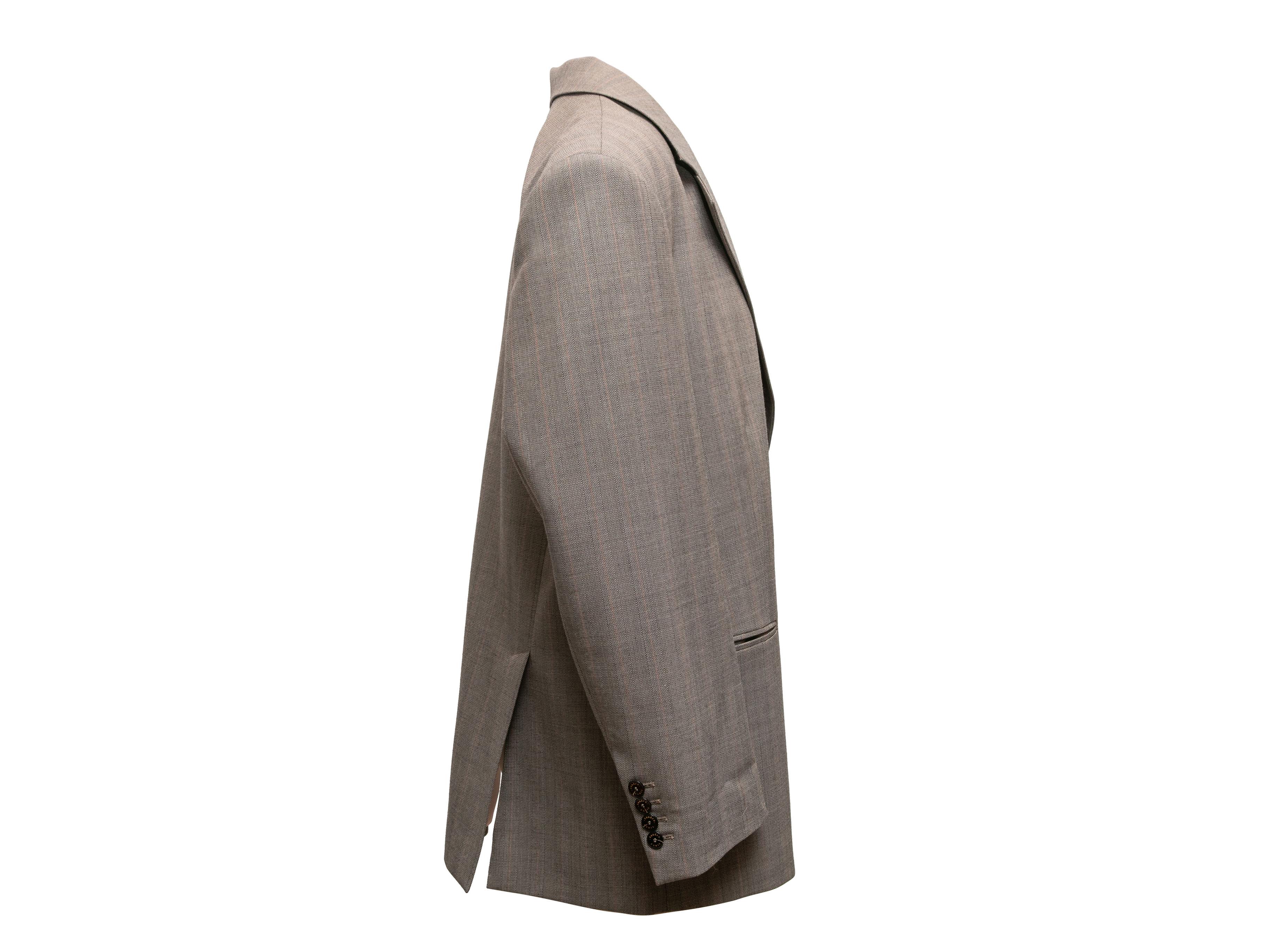 Taupe blazer by Sandro. Notched lapel featuring pin accent. Three welt pockets. Button closures at front. 42