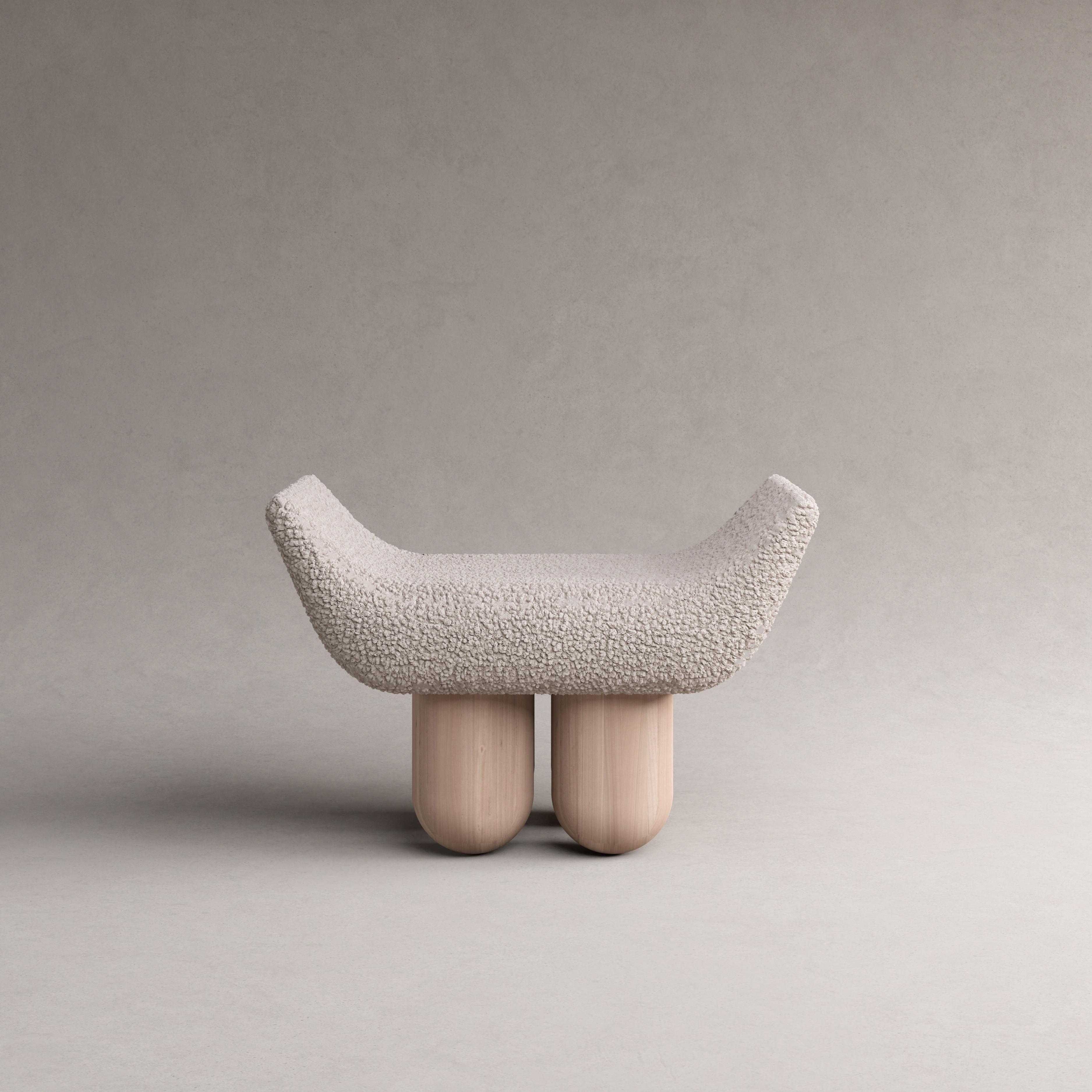 Taurus by Pietro Franceschini
Sold exclusively by Galerie Philia
Manufacturer: Stefano Minotti
Dimensions: W 76 x L 52 x H 54 cm
Materials: Lamb and ashwood.
Available in Bouclé.

Pietro Franceschini is an architect and designer based in New