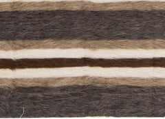 Tapis rayé marron, blanc, gris et en poils de chèvre de la collection Taurus de Doris Leslie Blau