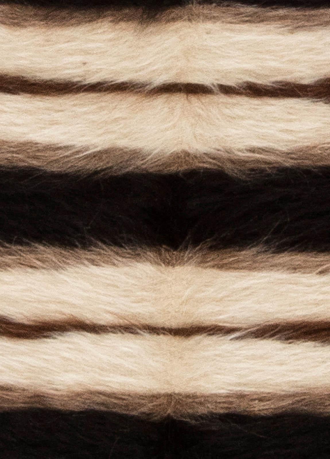 Taurus Collection striped brown, white and black goat hair rug by Doris Leslie Blau.
Size: 2.10