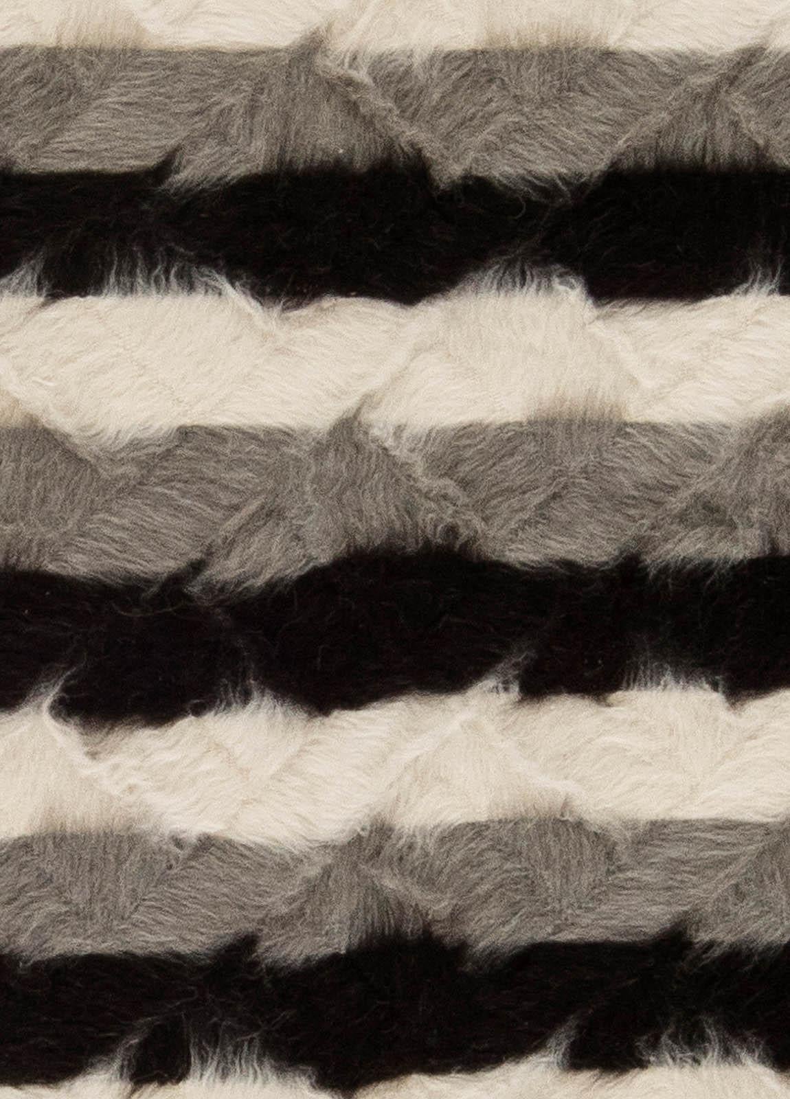 Taurus collection striped goat hair rug by Doris Leslie Blau.
Size: 4'0