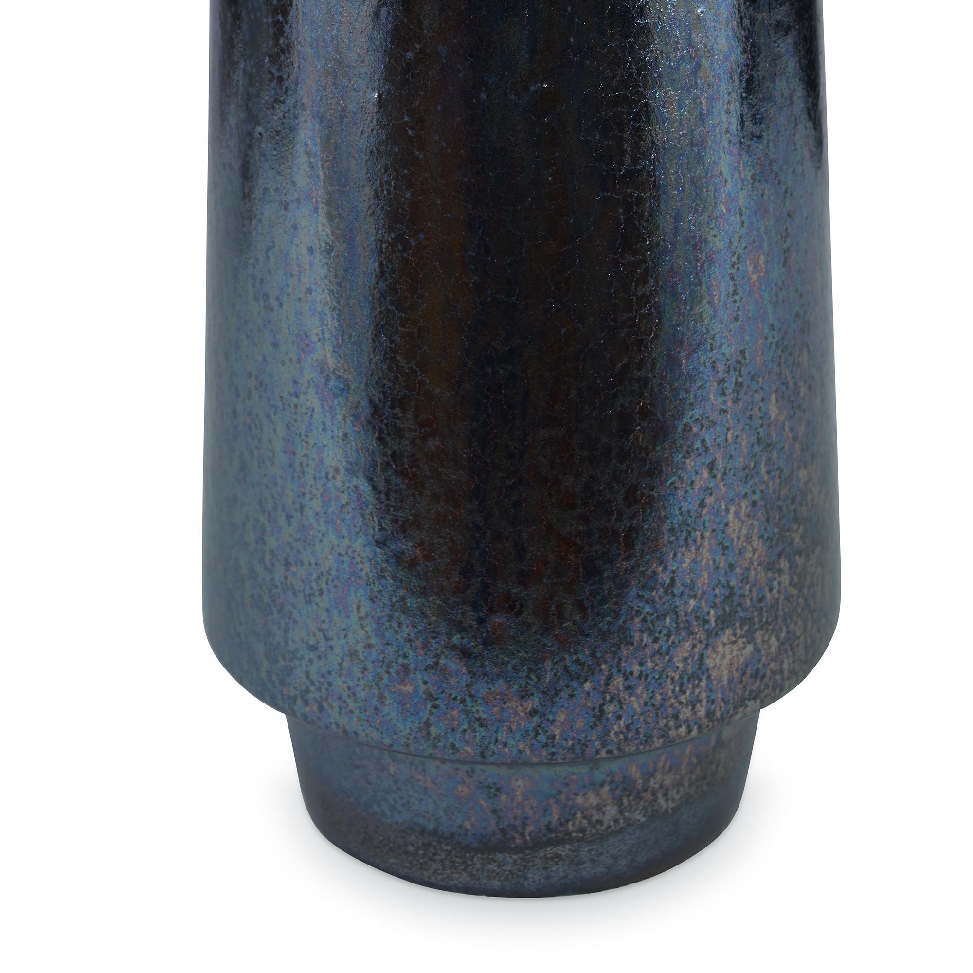 A tall earthenware vase featuring a reactive stone glaze. Due to the nature of the glaze, each vase is to be considered unique.
 