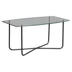 1950s coffee table by Jacques Hitier with a rectangular glass top.
