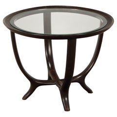 Table basse des années 1950 en bois teinté d'ébène et verre