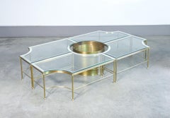 Low, modular Hollywood Regency-style coffee table with a plant stand. 1970s