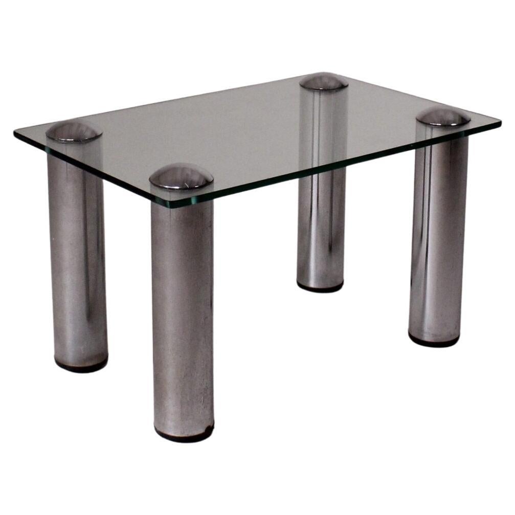 Low glass and steel coffee table, Manifattura Italiana, circa 1970 For Sale