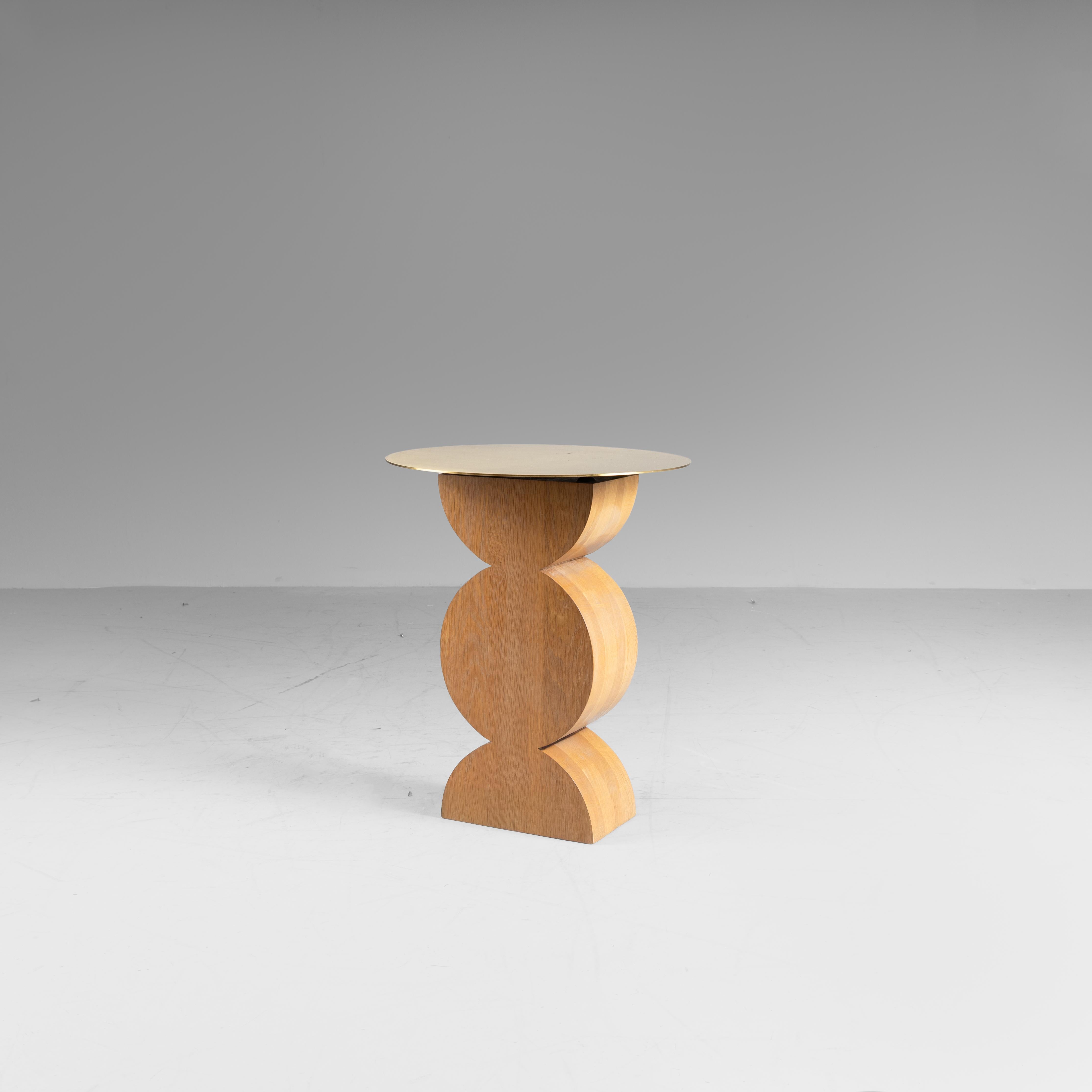 Constantin coffee table, Studio Simon, Italy, ca. 1970.  
A tribute to Constantin Brancusi, the Constantin coffee table was designed by Studio Simon, founded by Dino Gavina, a key figure in Italian design. The base is shaped in solid oak with a wax