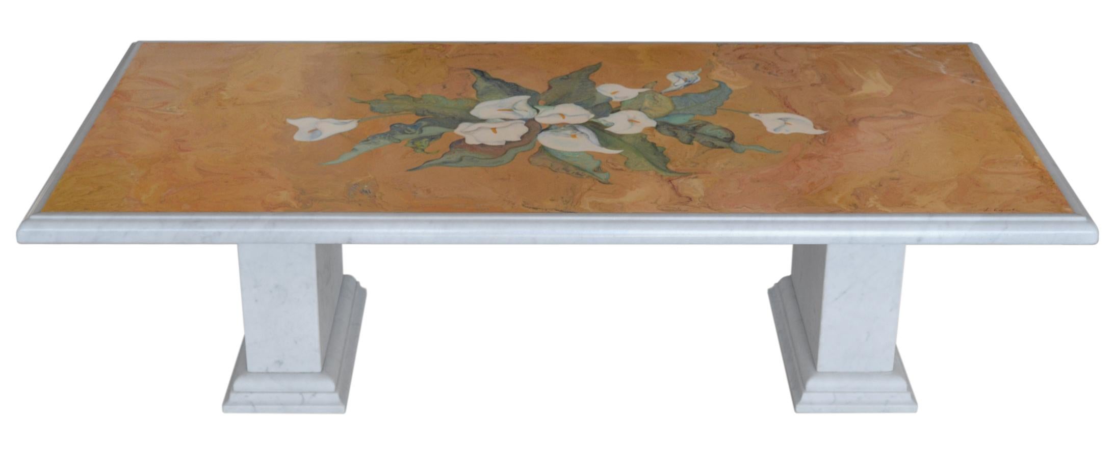 Coffee table made with the decorative technique of 'scagliola inlay on a White Carrara marble top, which rests on two rectangular columns also made of white marble. The central calla lily bouquet is the 'expression of our capabilities  artistic that