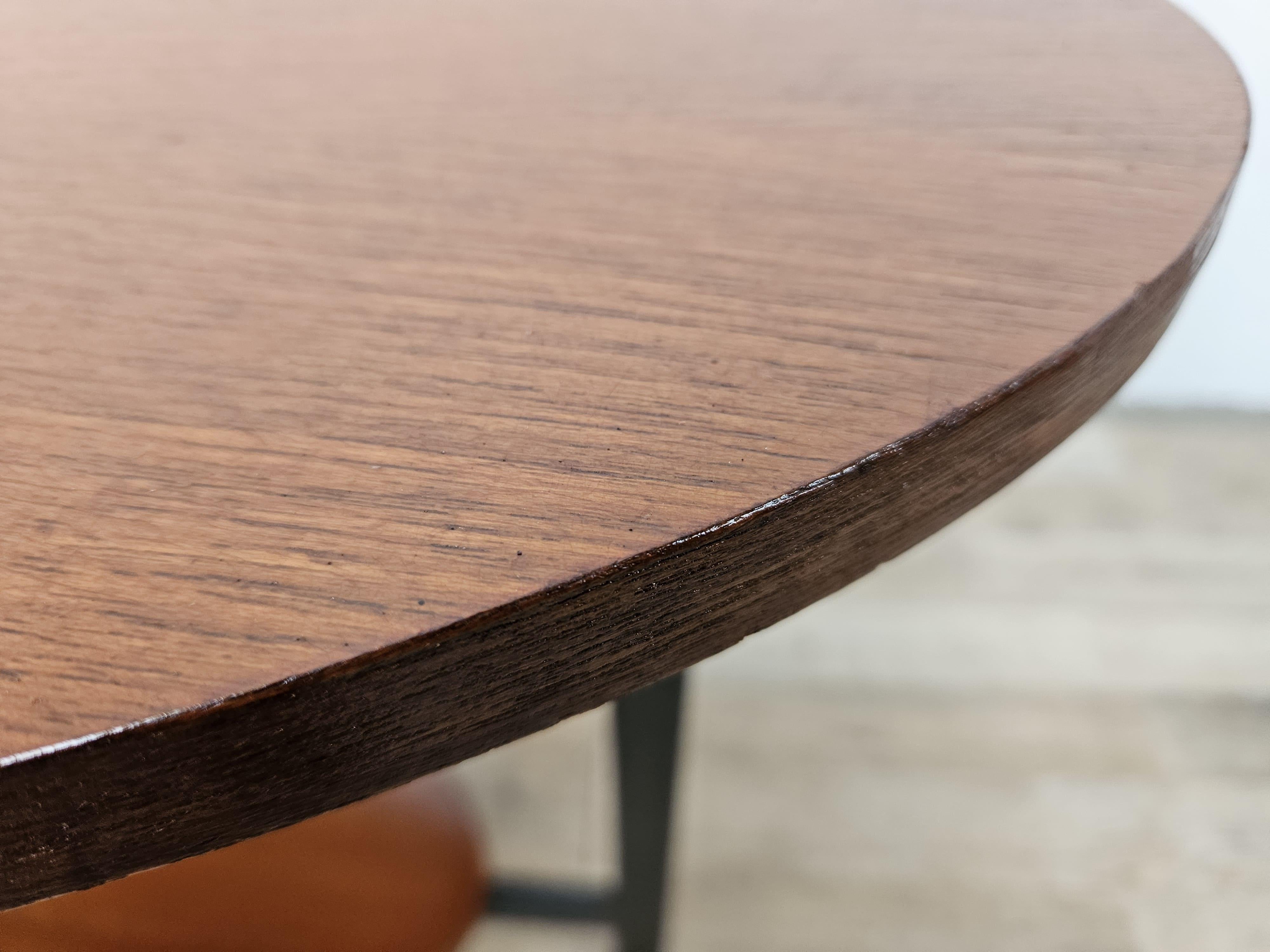 Iron Scandinavian 1960s teak coffee table with adjustable feet For Sale